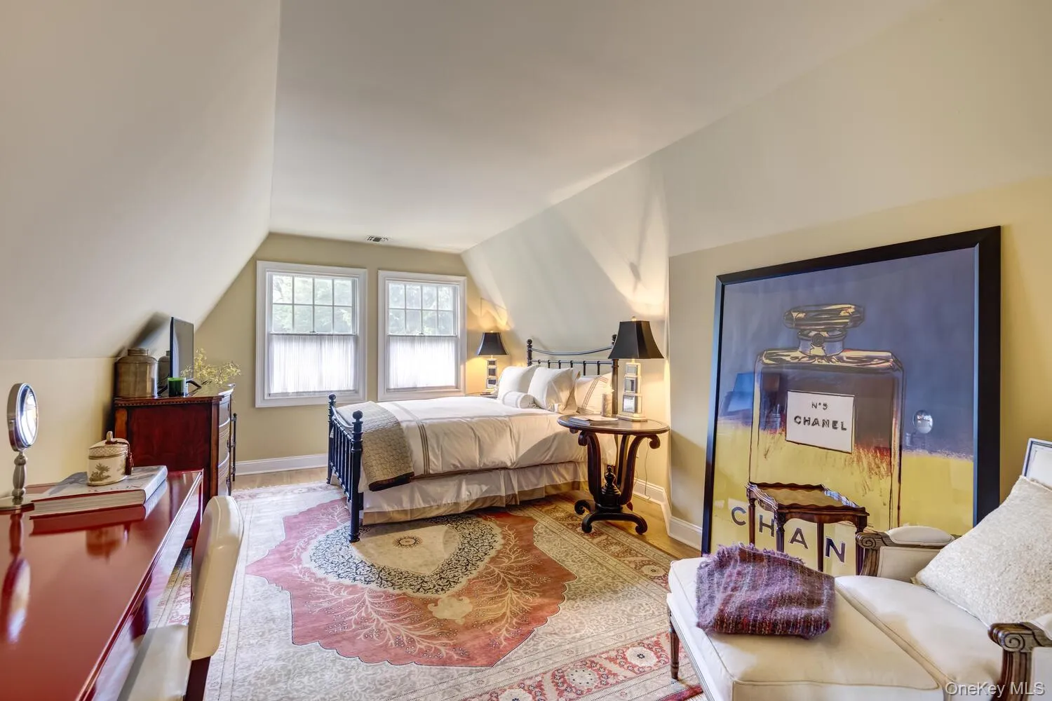 Bedroom featuring lofted ceiling Bedroom featuring lofted ceiling