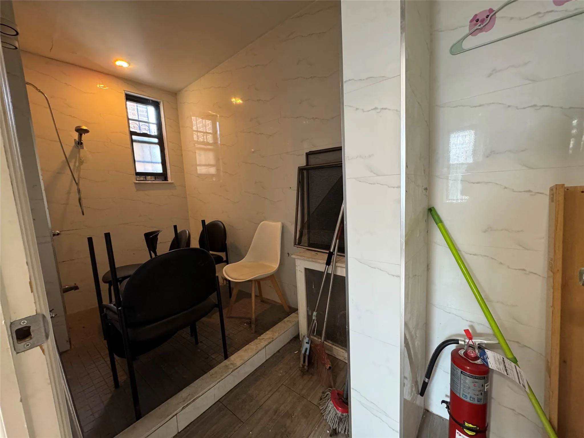 Below grade area featuring wood finished floors Below grade area featuring wood finished floors