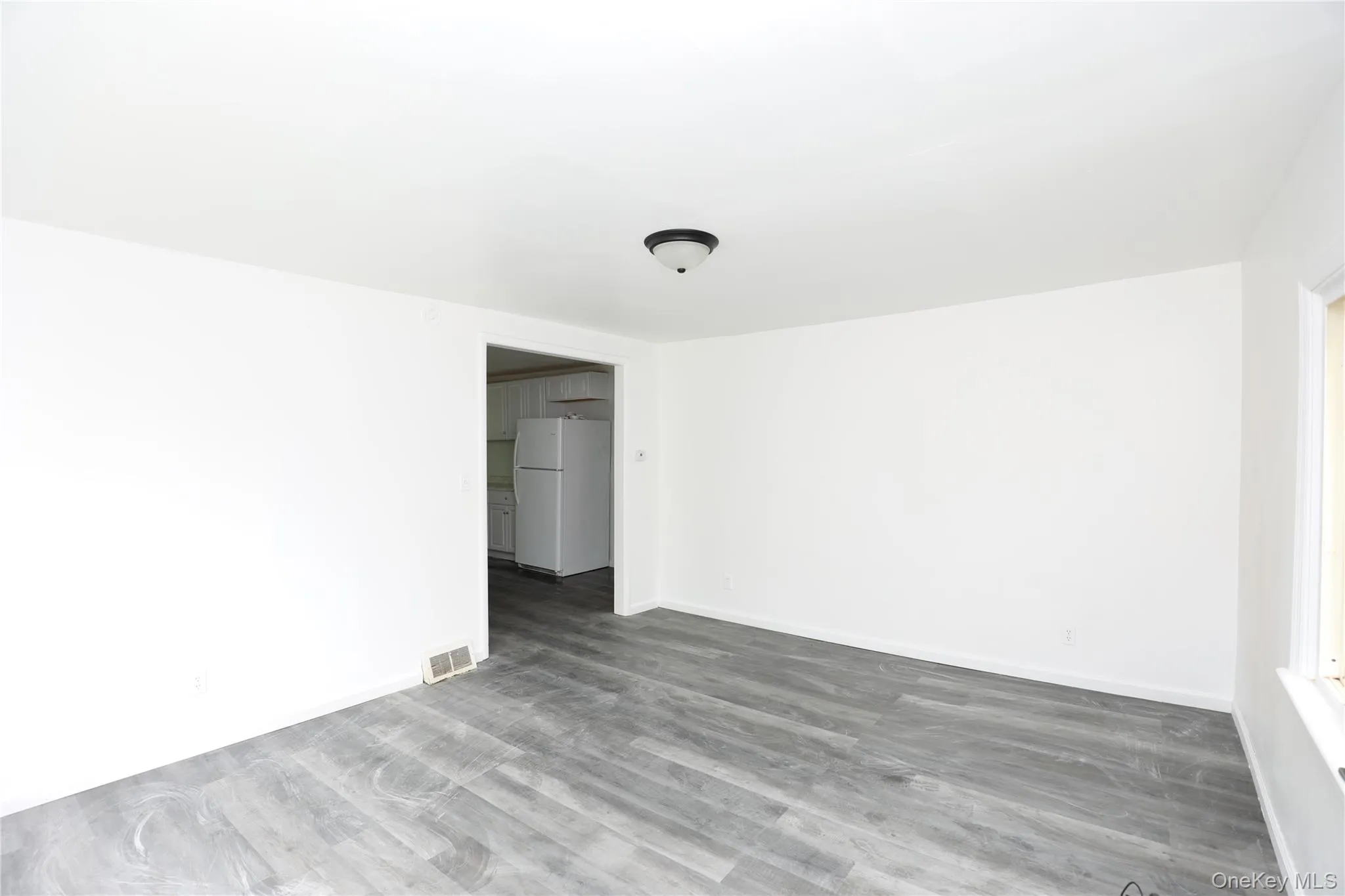 Unfurnished room featuring baseboards Unfurnished room featuring baseboards