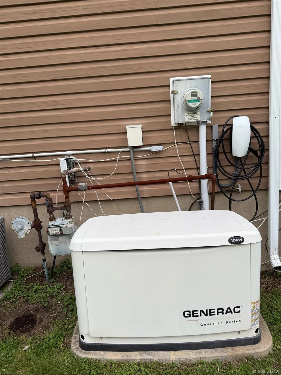 Exterior view of a power unit and electric meter Exterior view of a power unit and electric meter