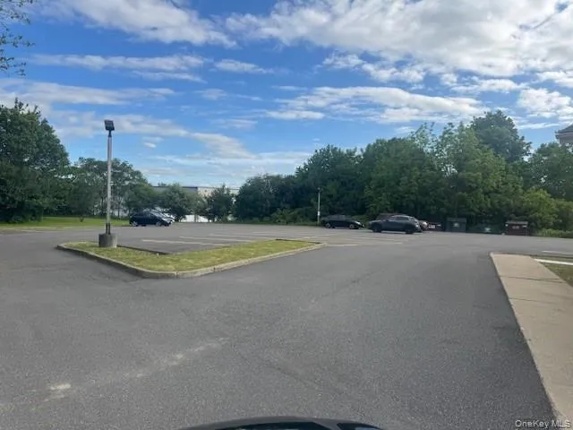 Additional Parking in the back of the building Additional Parking in the back of the building