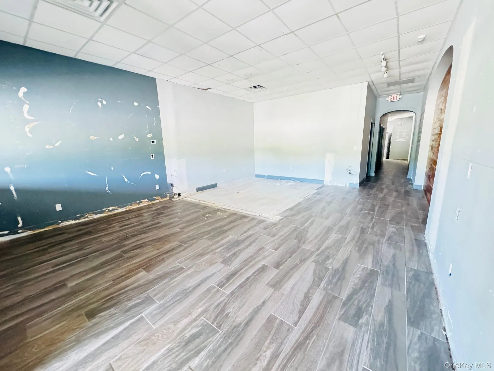 Large Front office or retail area leads to private rooms with sinks Large Front office or retail area leads to private rooms with sinks