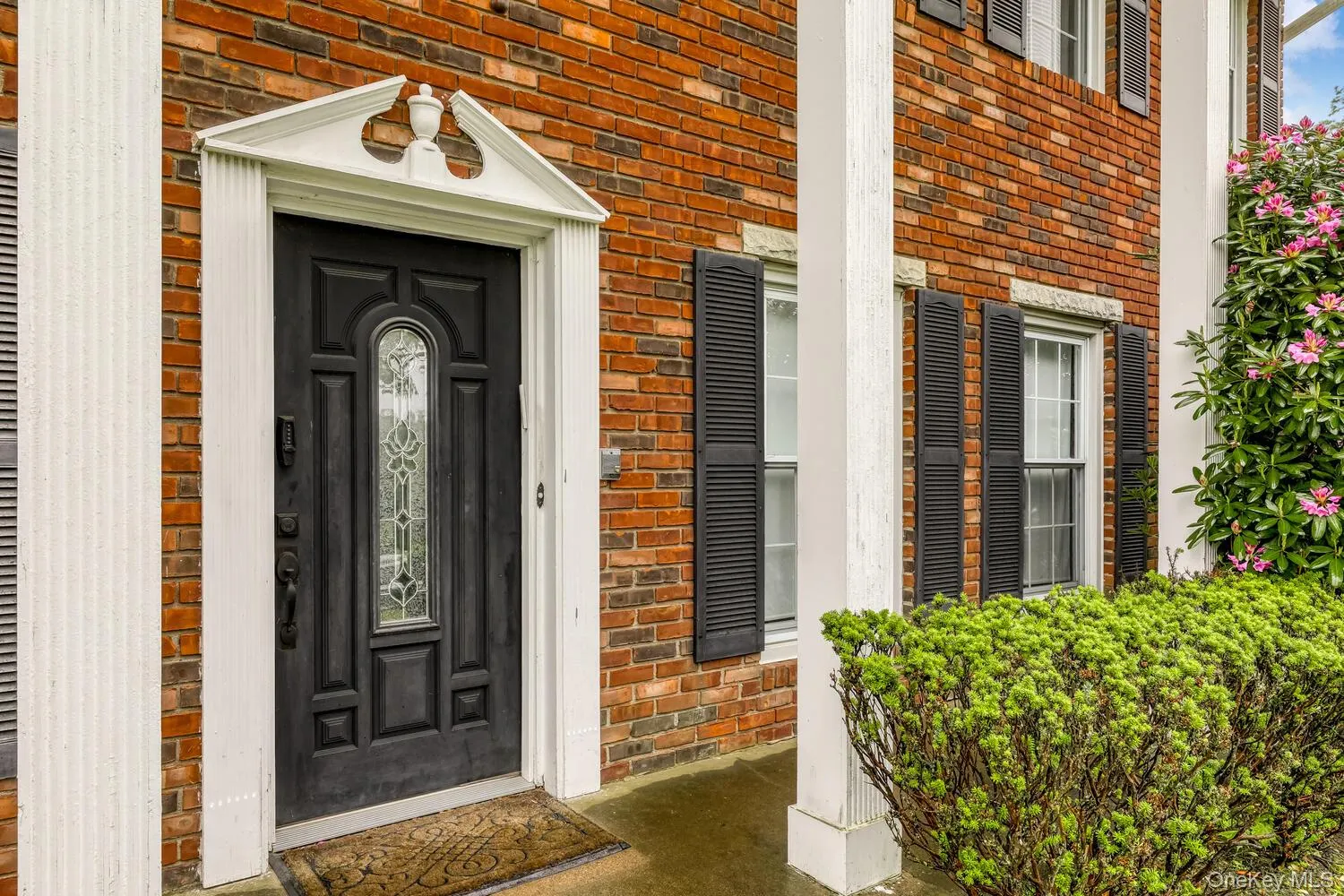 Entrance to property with brick siding Entrance to property with brick siding
