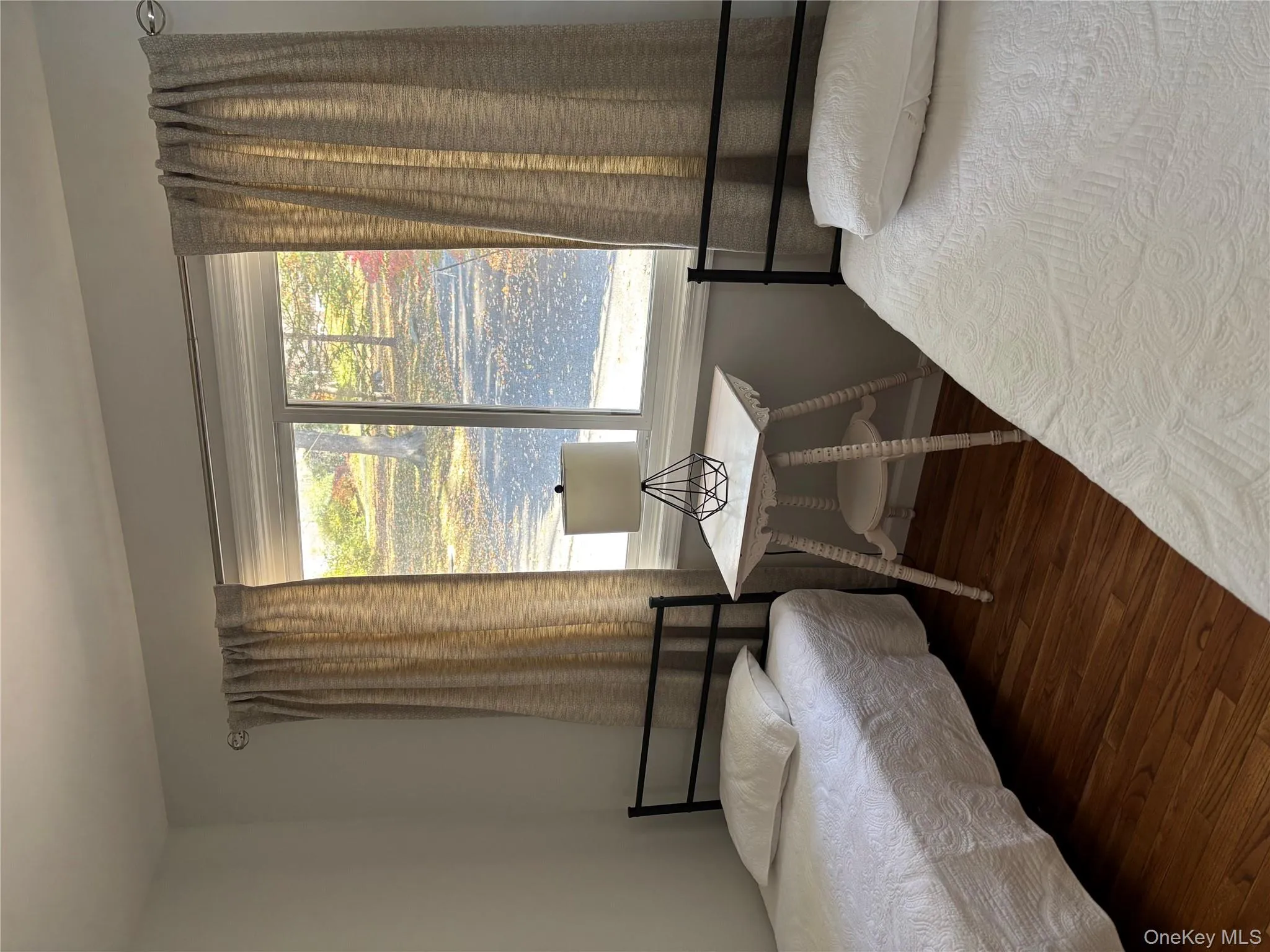 Bedroom with wood finished floors Bedroom with wood finished floors