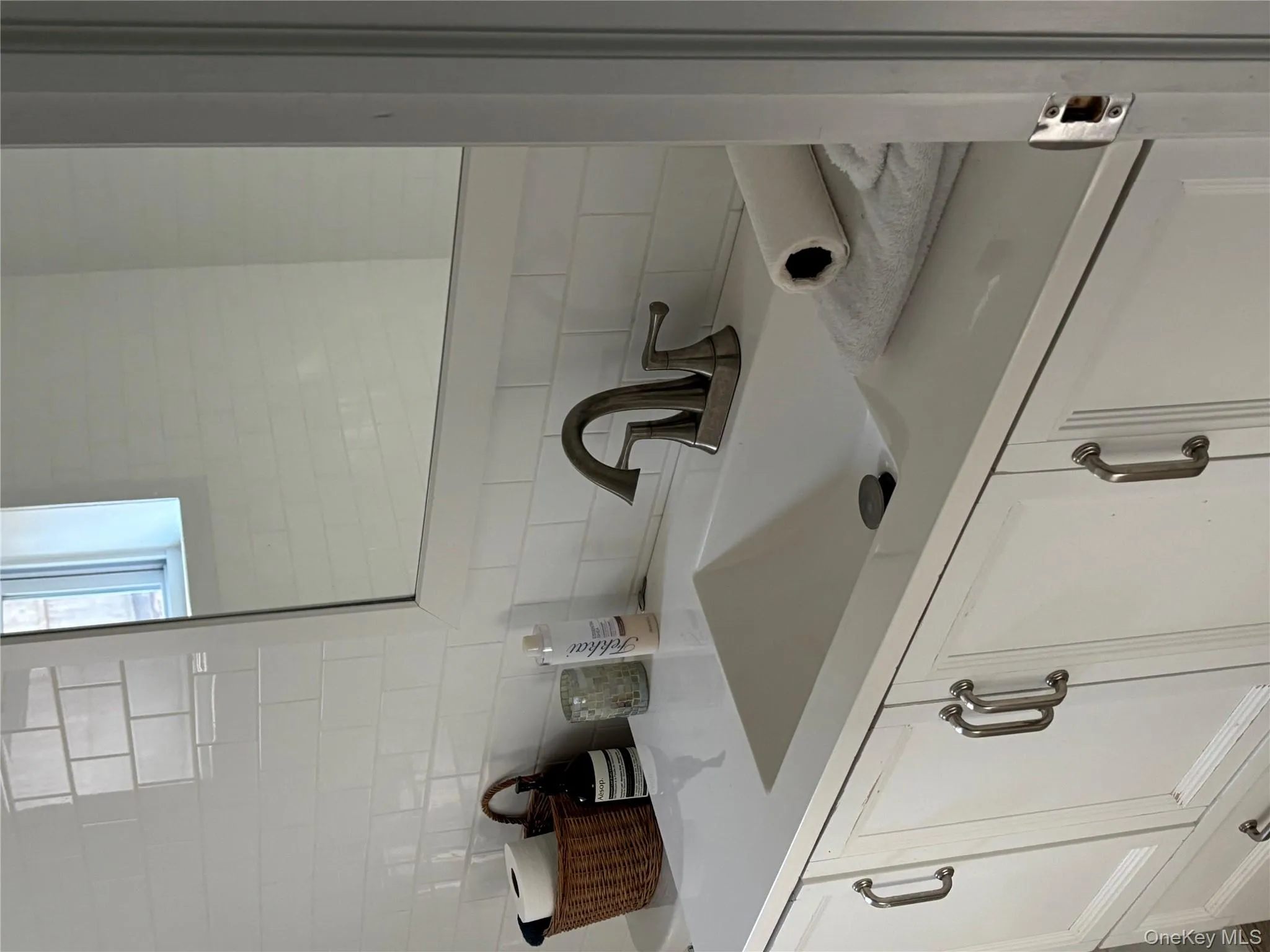 Bathroom with vanity and backsplash Bathroom with vanity and backsplash