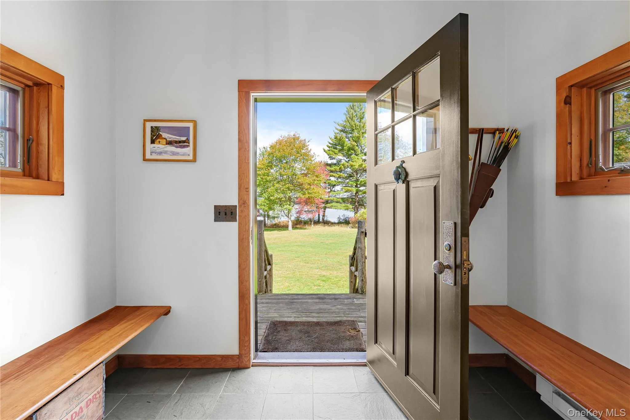 Entryway featuring baseboards and baseboard heating Entryway featuring baseboards and baseboard heating
