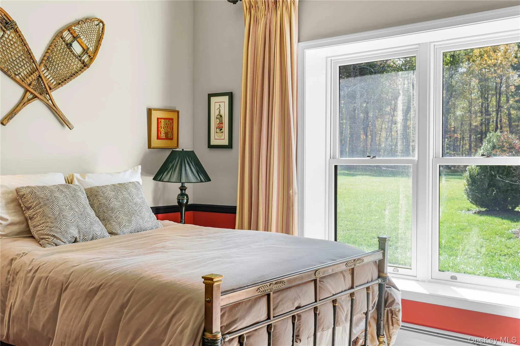 Bedroom featuring multiple windows Bedroom featuring multiple windows