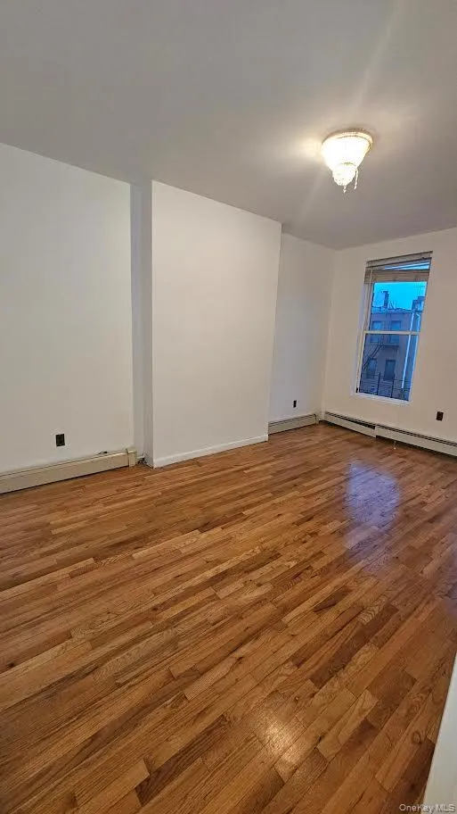 featuring wood finished floors. featuring wood finished floors.
