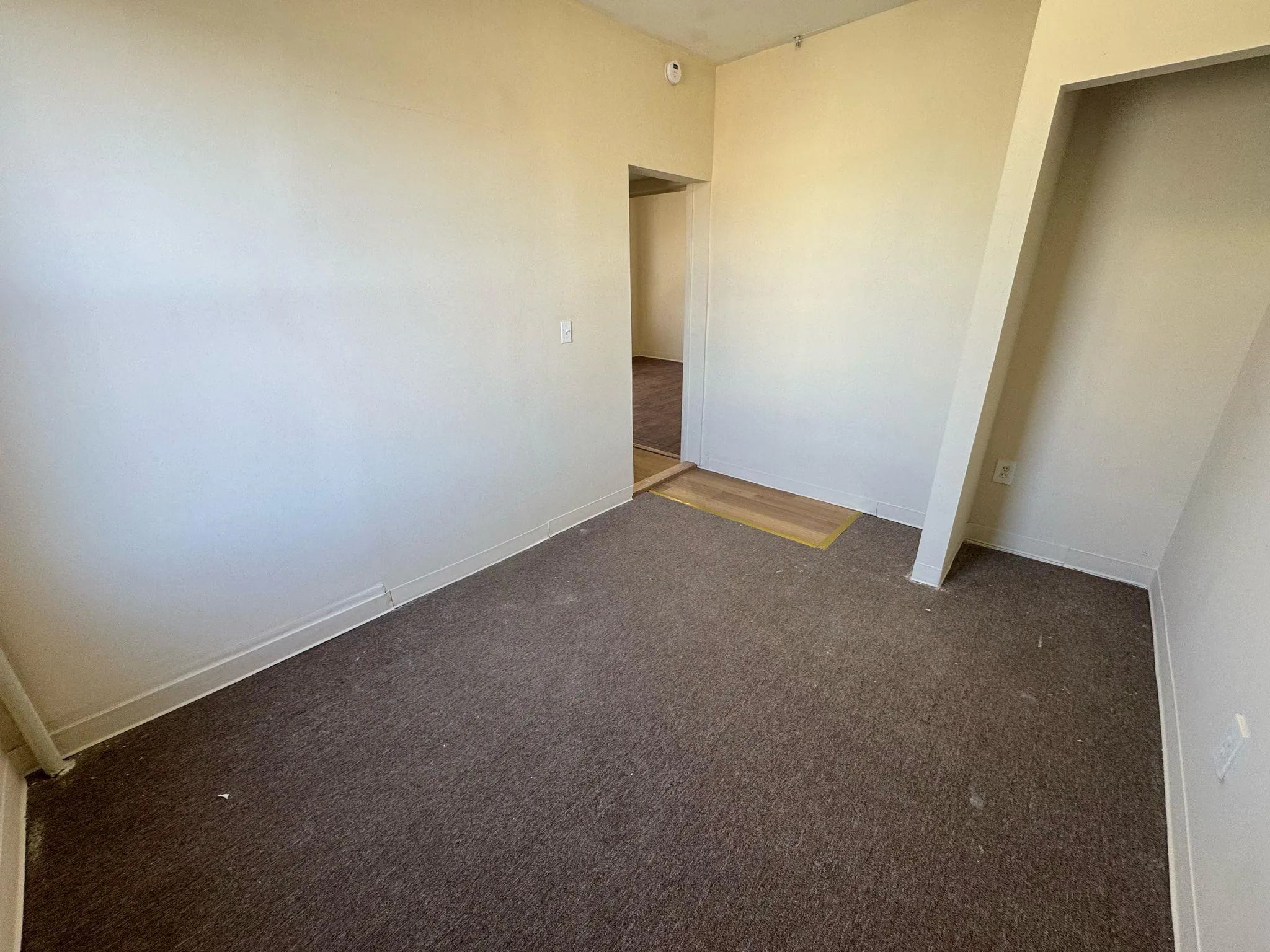 Unfurnished bedroom featuring carpet floors and baseboards Unfurnished bedroom featuring carpet floors and baseboards