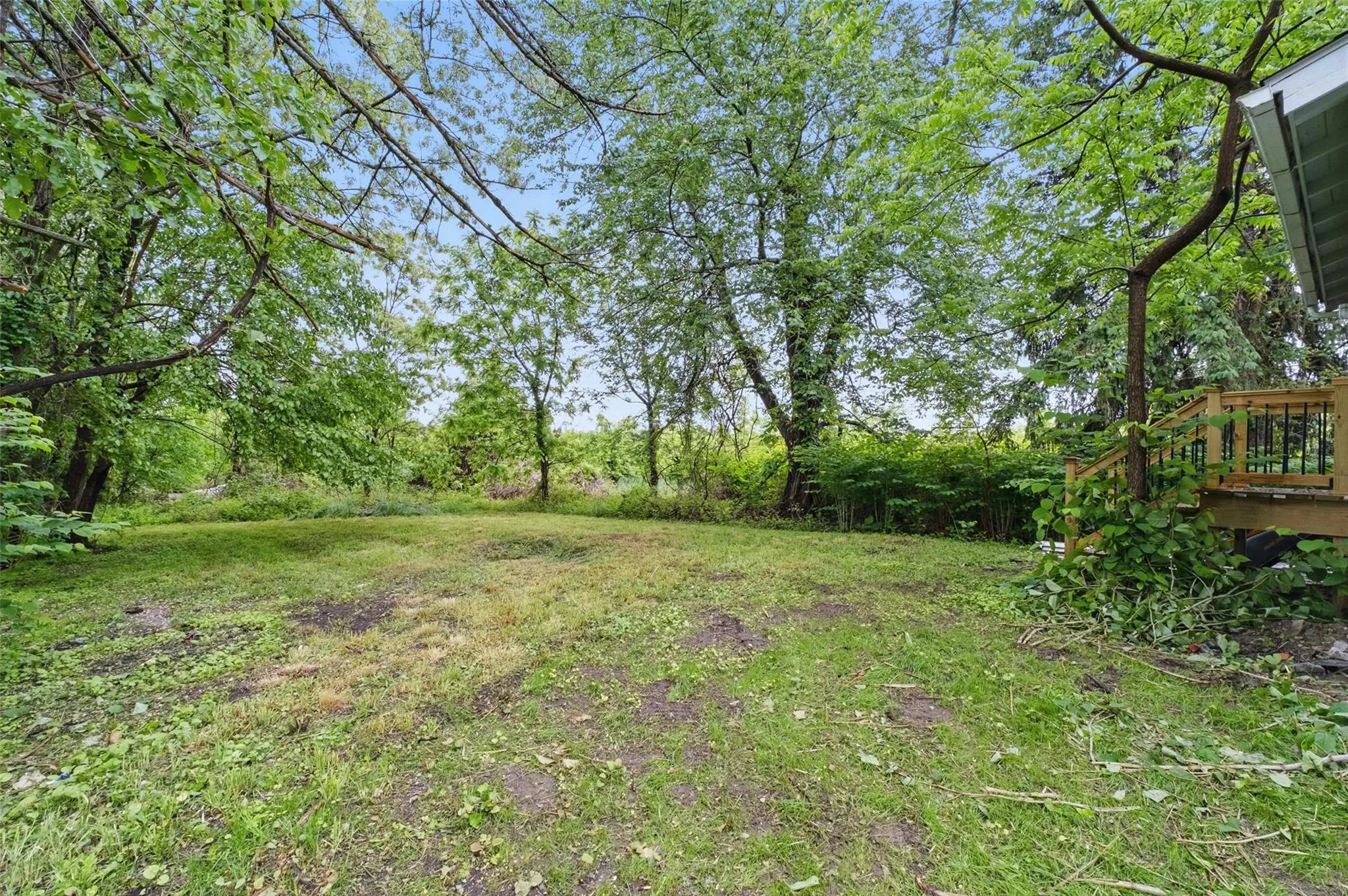 View of yard featuring a wooden deck View of yard featuring a wooden deck