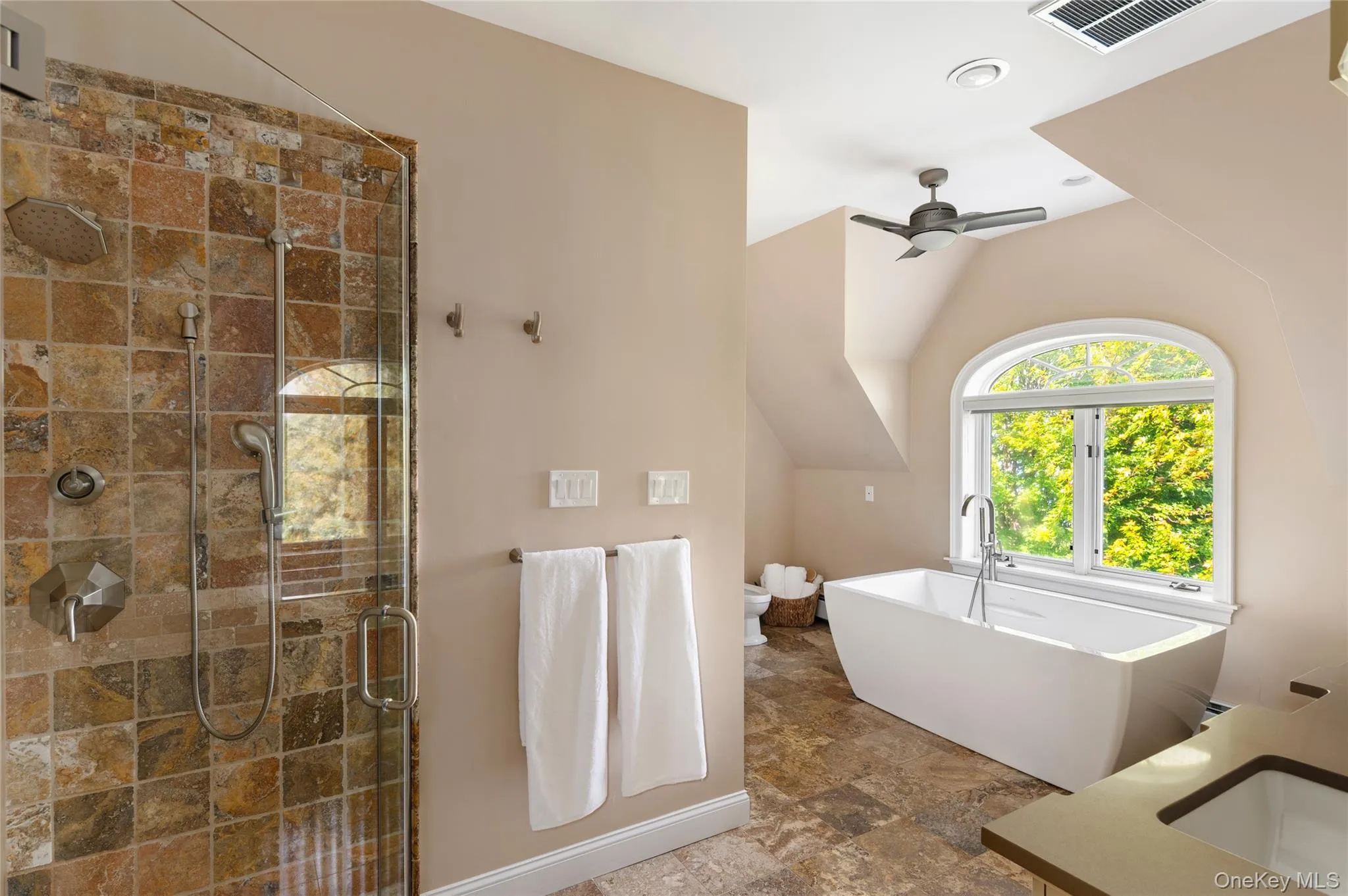 Bidet, shower, quartz counters, soaking tub with river view. Bidet, shower, quartz counters, soaking tub with river view.