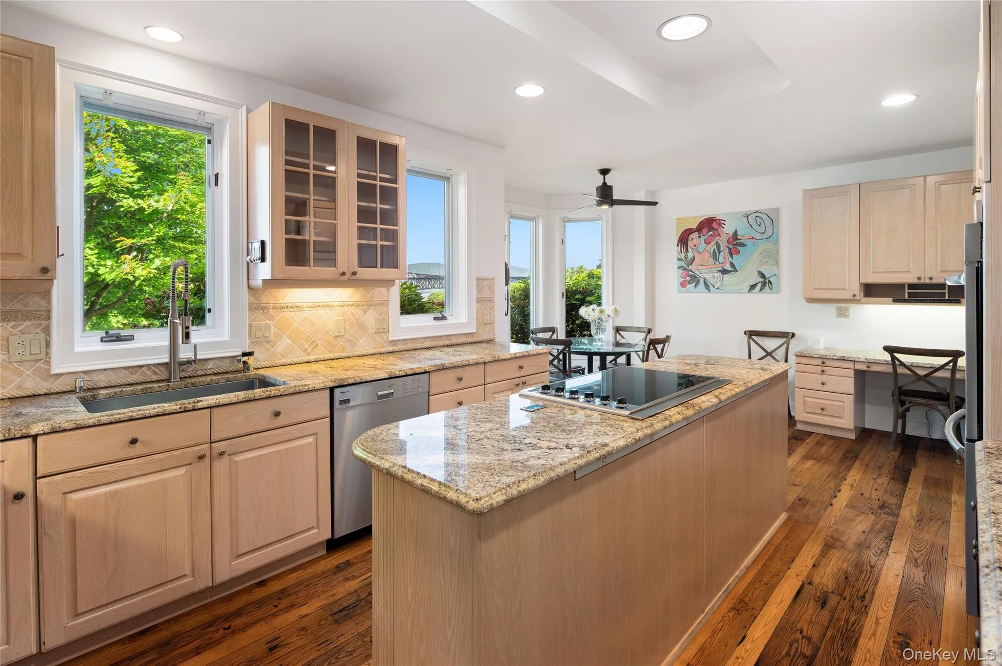 Water view, double oven, Viking cooktop, recessed lighting. Water view, double oven, Viking cooktop, recessed lighting.