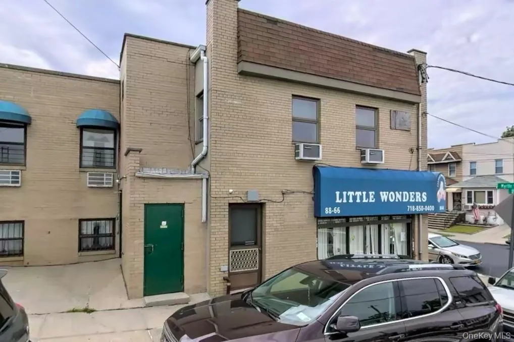 View of property featuring cooling unit View of property featuring cooling unit