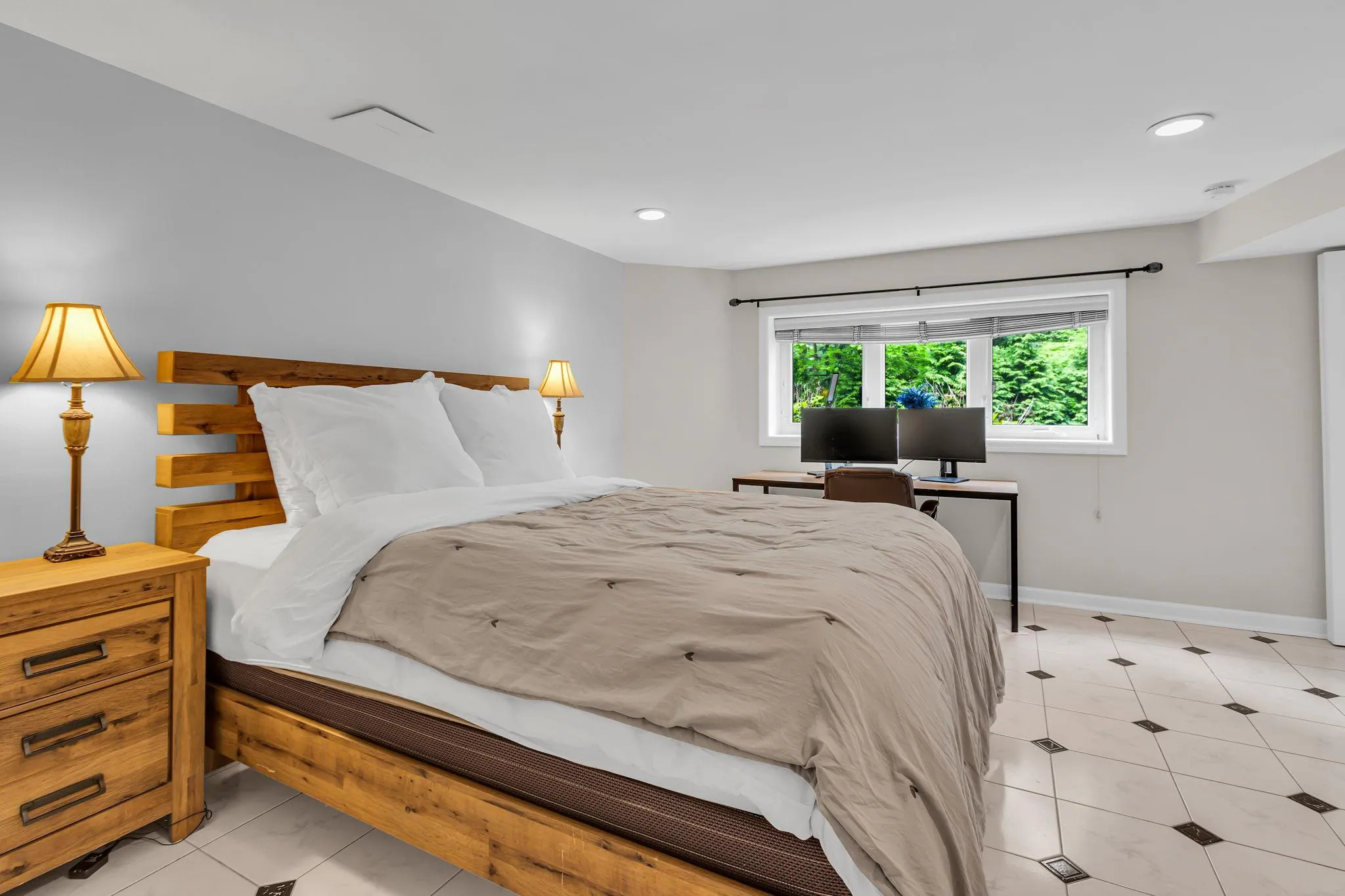 Bedroom with recessed lighting, baseboards, and light tile patterned flooring Bedroom with recessed lighting, baseboards, and light tile patterned flooring