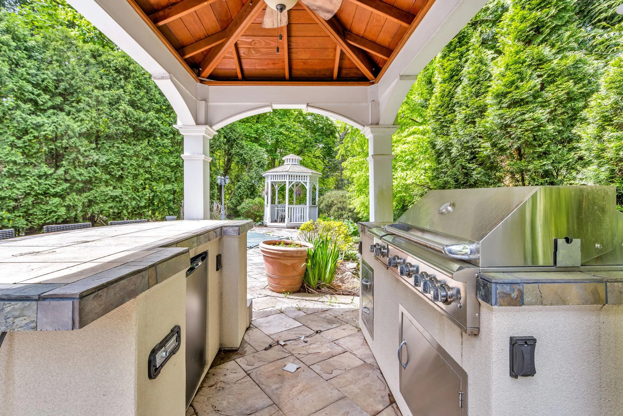 View of patio / terrace featuring a gazebo View of patio / terrace featuring a gazebo