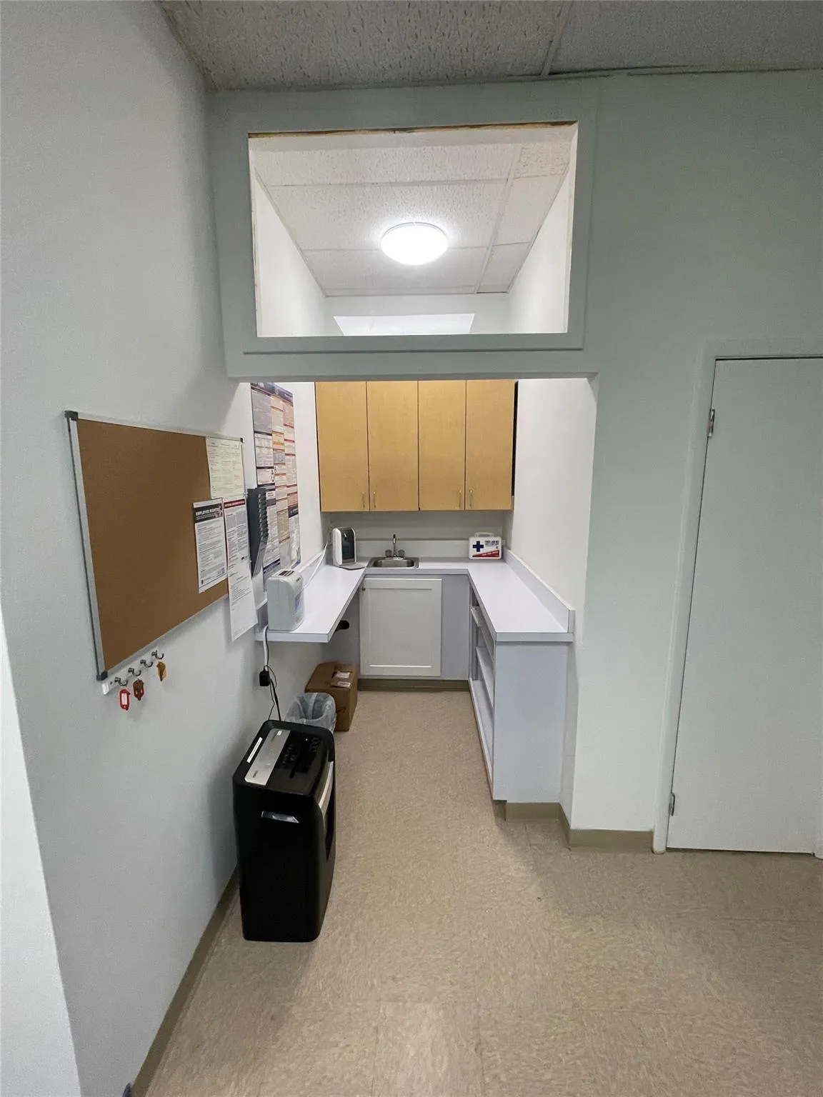 Washroom featuring a sink and baseboards Washroom featuring a sink and baseboards