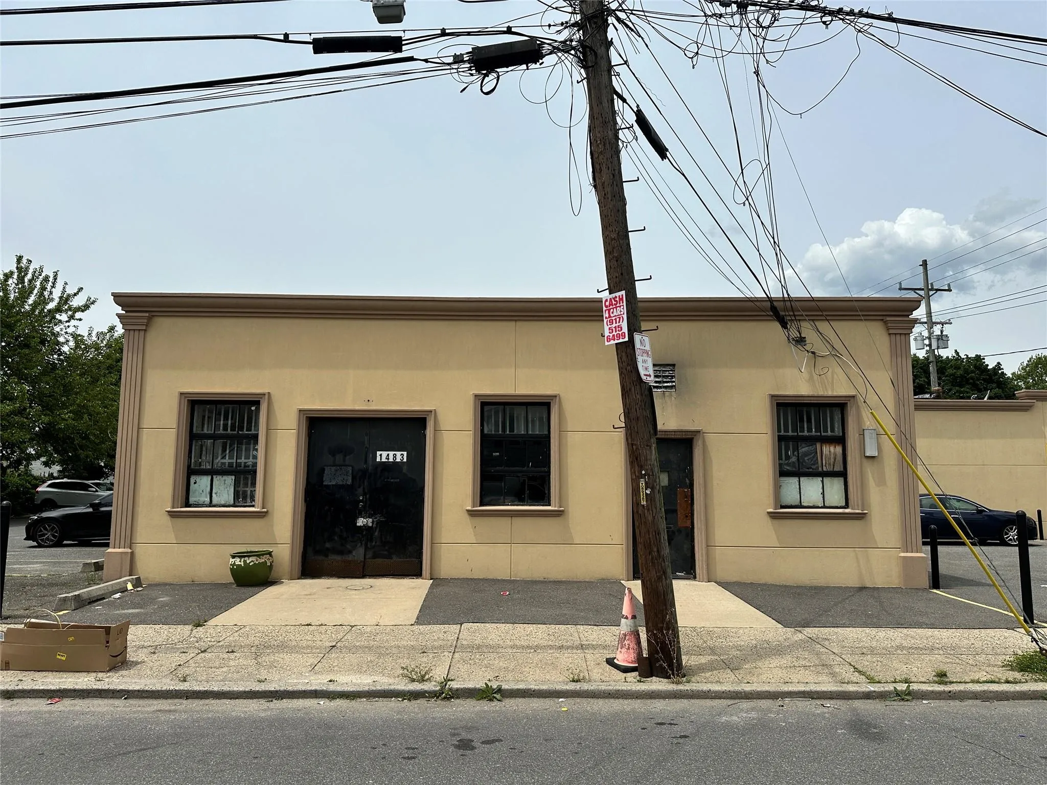 View of front facade featuring stucco siding View of front facade featuring stucco siding