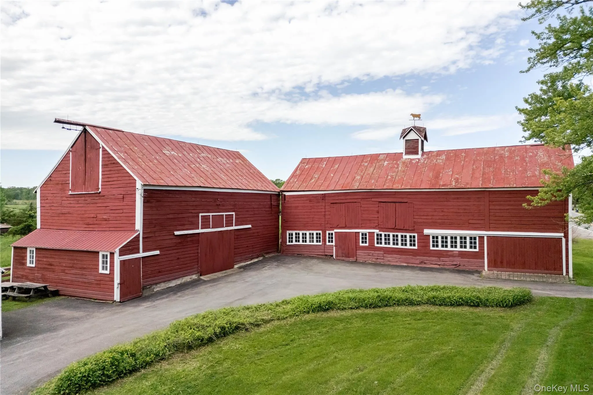 View of property featuring a barn View of property featuring a barn