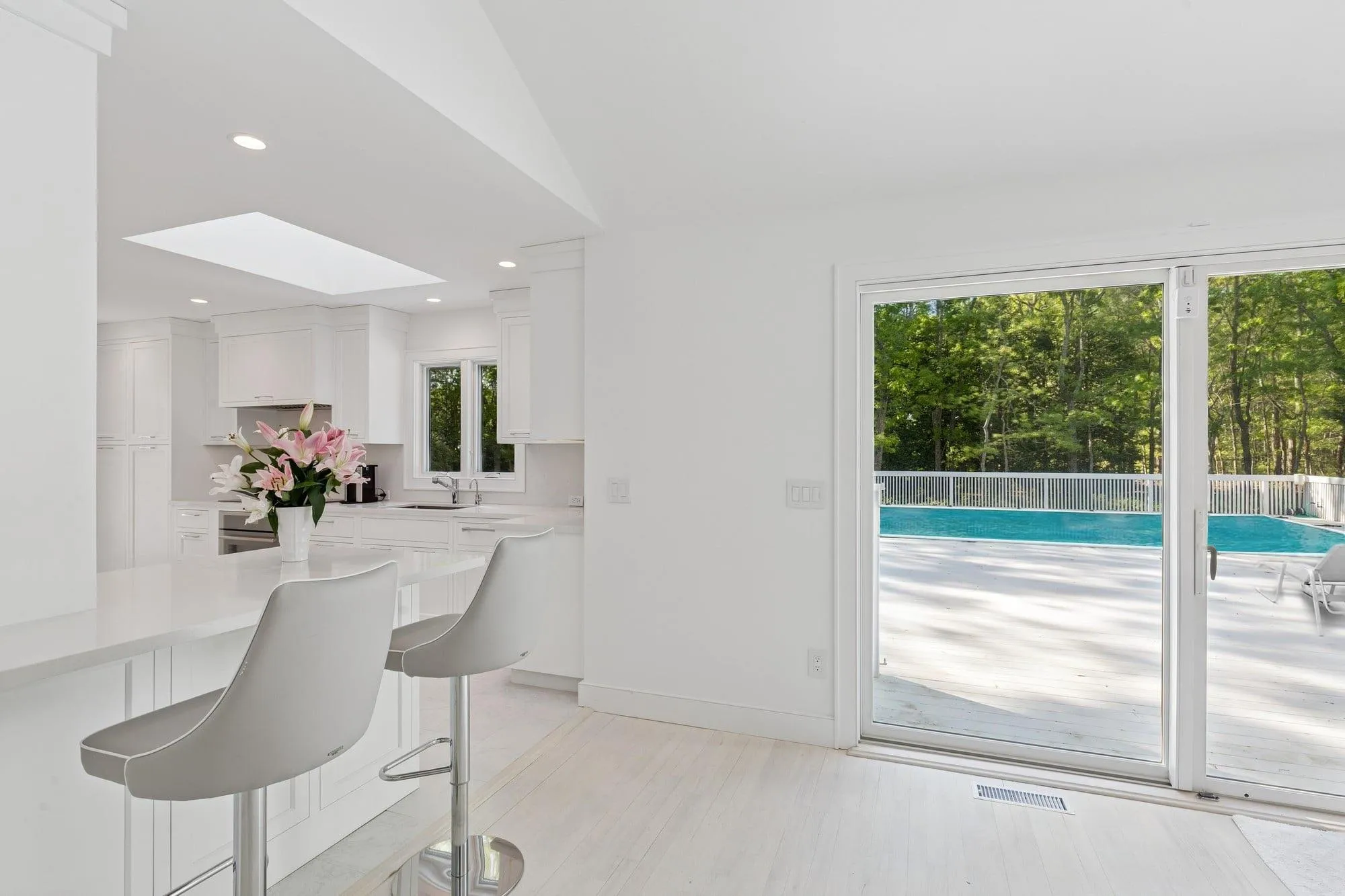 Dining area featuring a skylight and recessed lighting Dining area featuring a skylight and recessed lighting