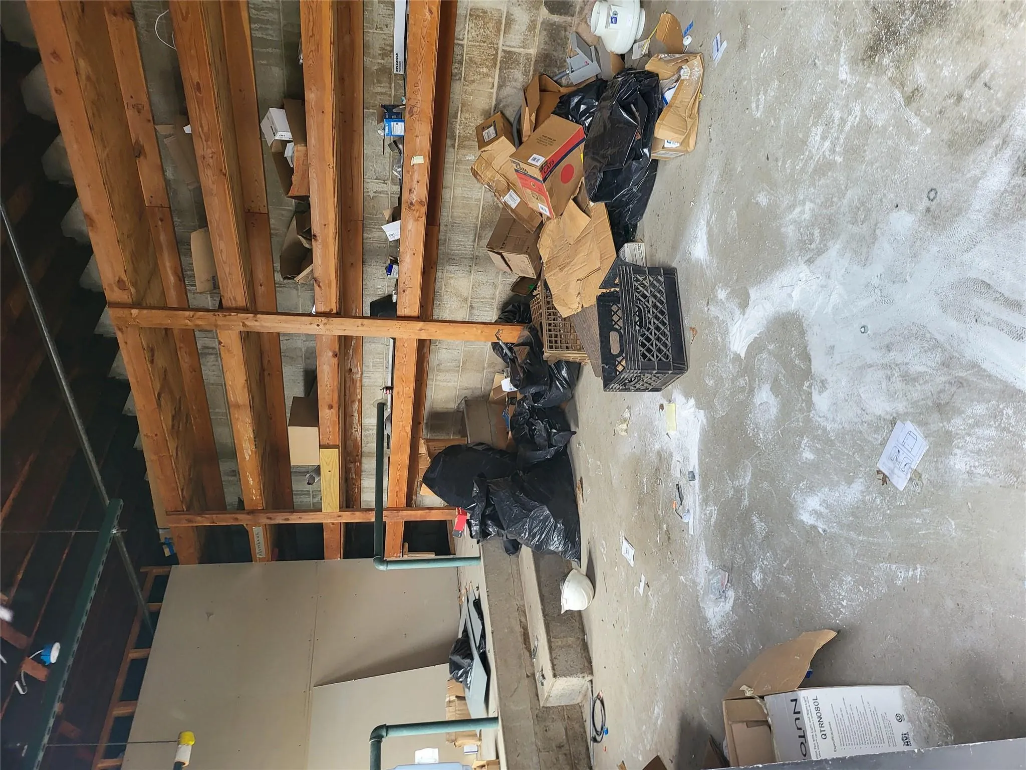 Basement featuring a garage Basement featuring a garage