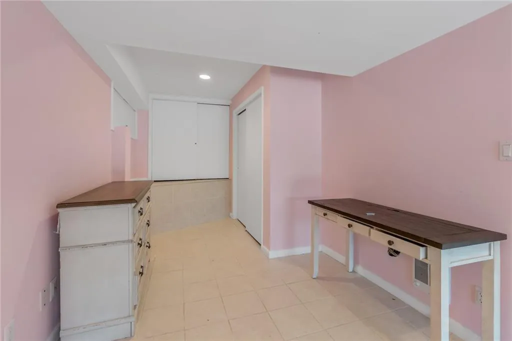 Hall featuring recessed lighting and baseboards Hall featuring recessed lighting and baseboards