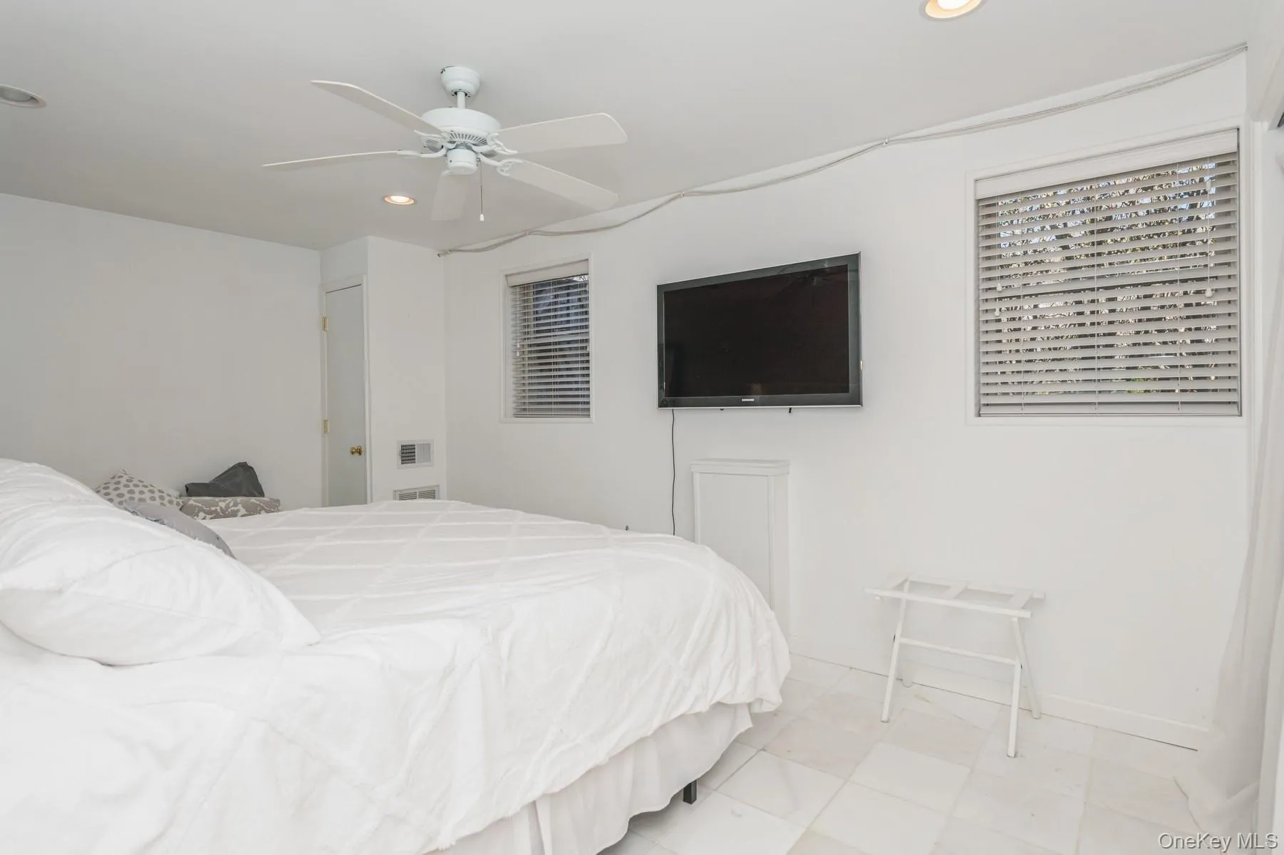 Bedroom with recessed lighting, baseboards, and ceiling fan Bedroom with recessed lighting, baseboards, and ceiling fan