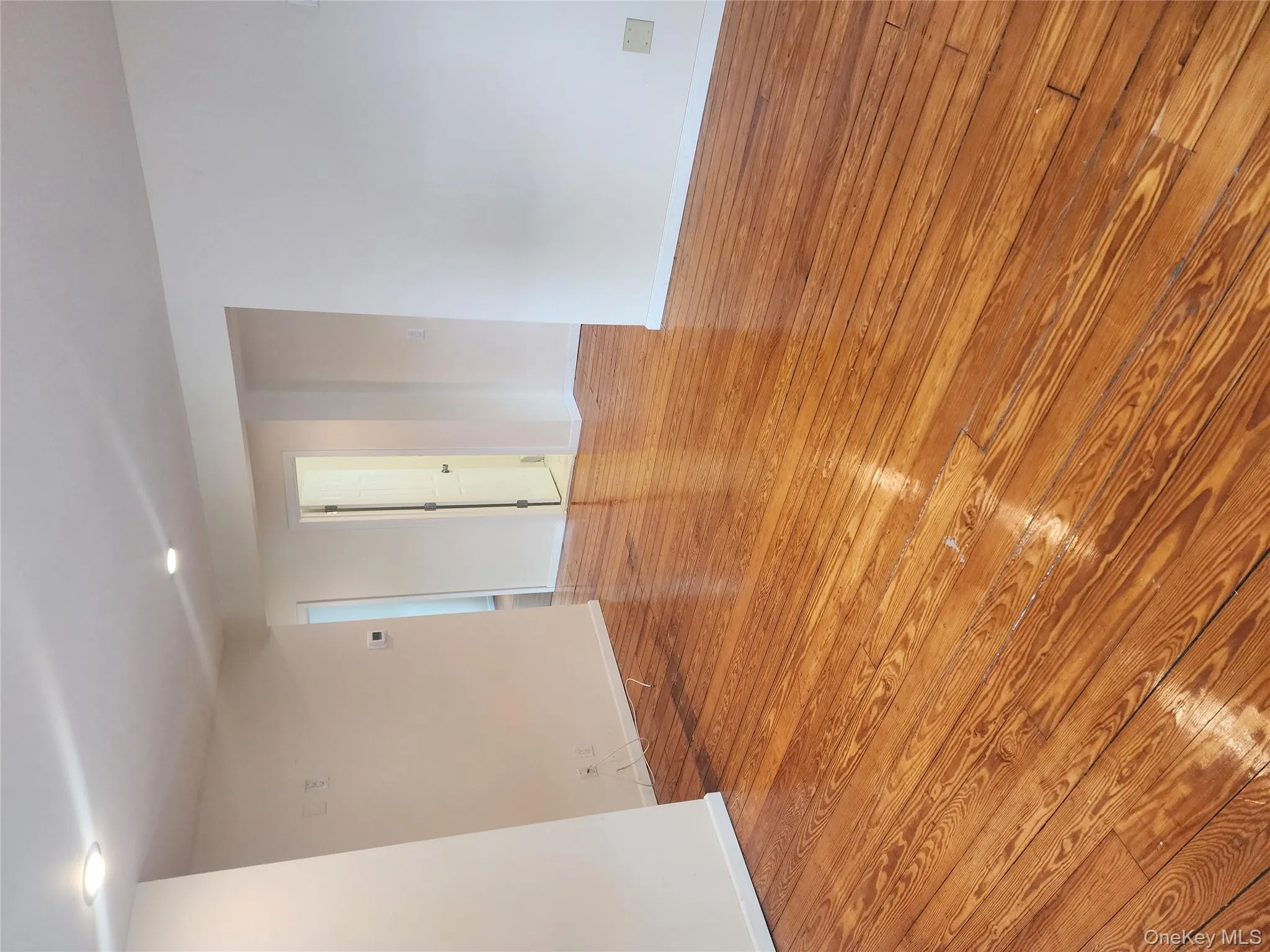 Spare room with light wood-style floors and recessed lighting Spare room with light wood-style floors and recessed lighting