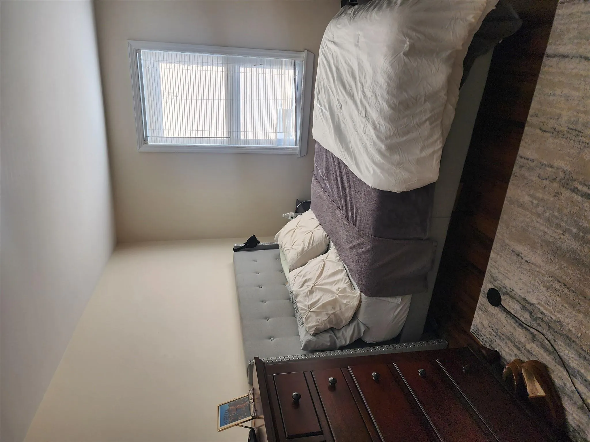 Bedroom with dark wood-style flooring Bedroom with dark wood-style flooring