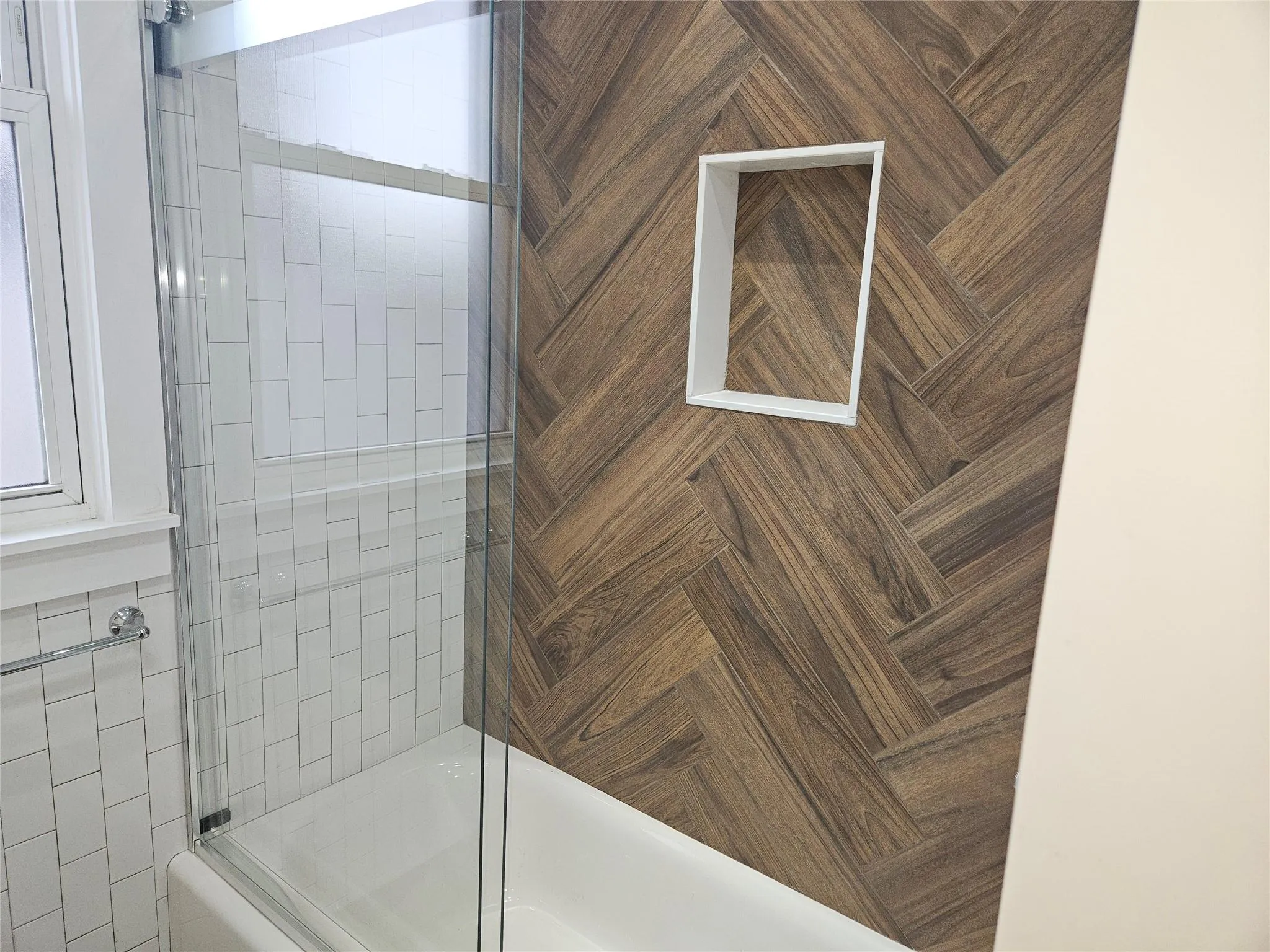 Bathroom featuring combined bath / shower with glass door Bathroom featuring combined bath / shower with glass door