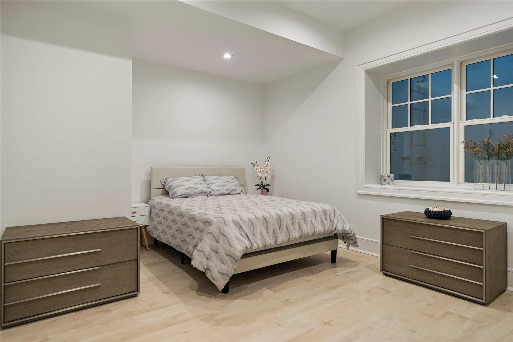 Bedroom featuring wood finished floors, baseboards, and recessed lighting Bedroom featuring wood finished floors, baseboards, and recessed lighting