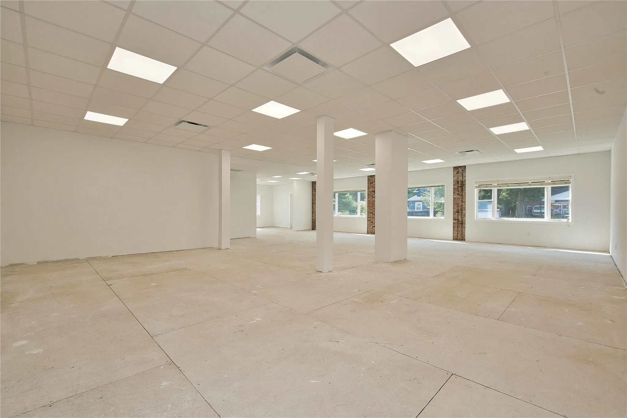 Empty room featuring a paneled ceiling Empty room featuring a paneled ceiling