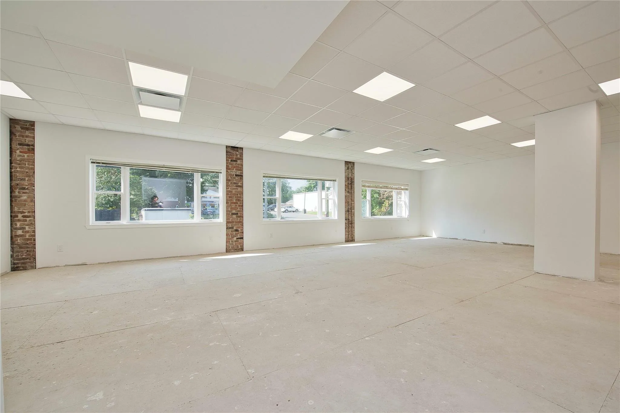 Spare room with a drop ceiling Spare room with a drop ceiling