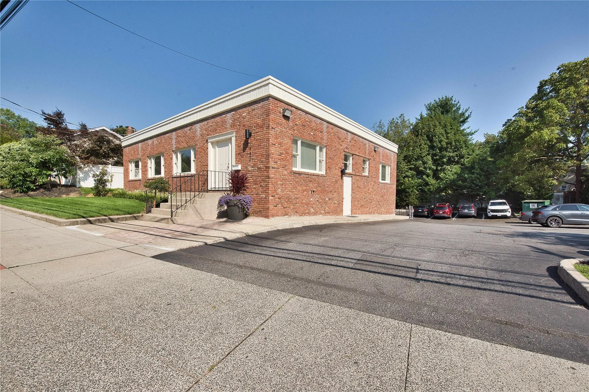 View of home\'s exterior with brick siding View of home\'s exterior with brick siding
