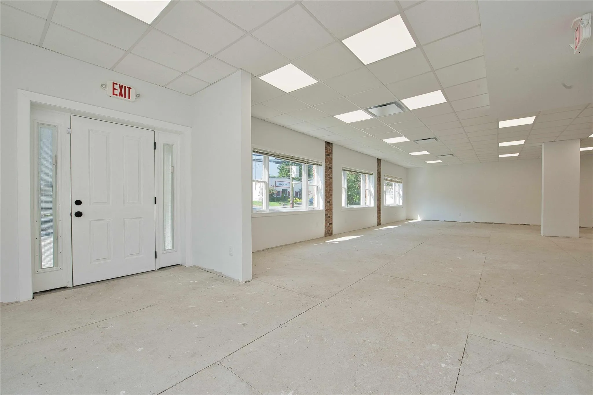 Unfurnished room featuring a paneled ceiling Unfurnished room featuring a paneled ceiling