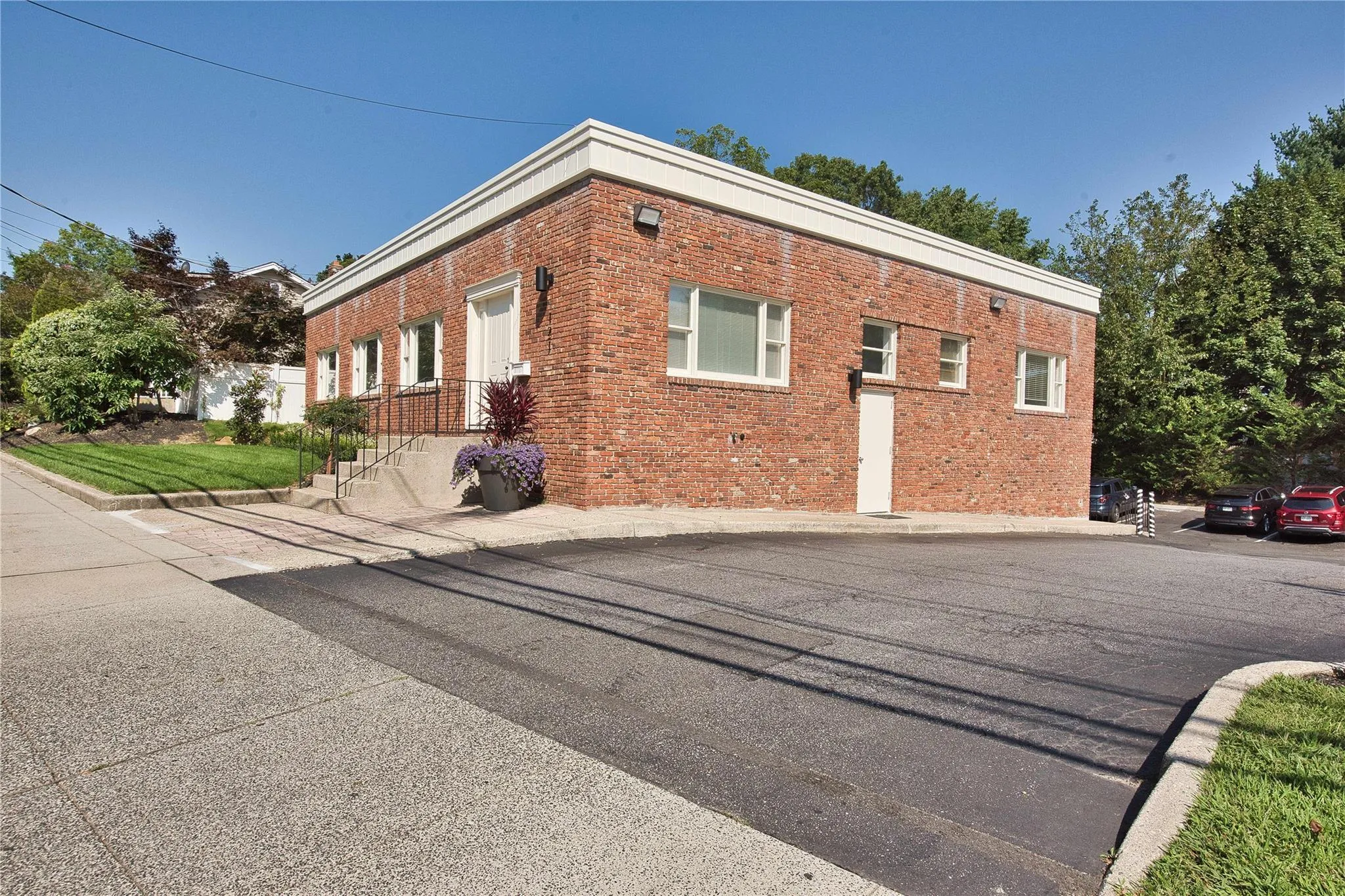View of property exterior featuring brick siding View of property exterior featuring brick siding