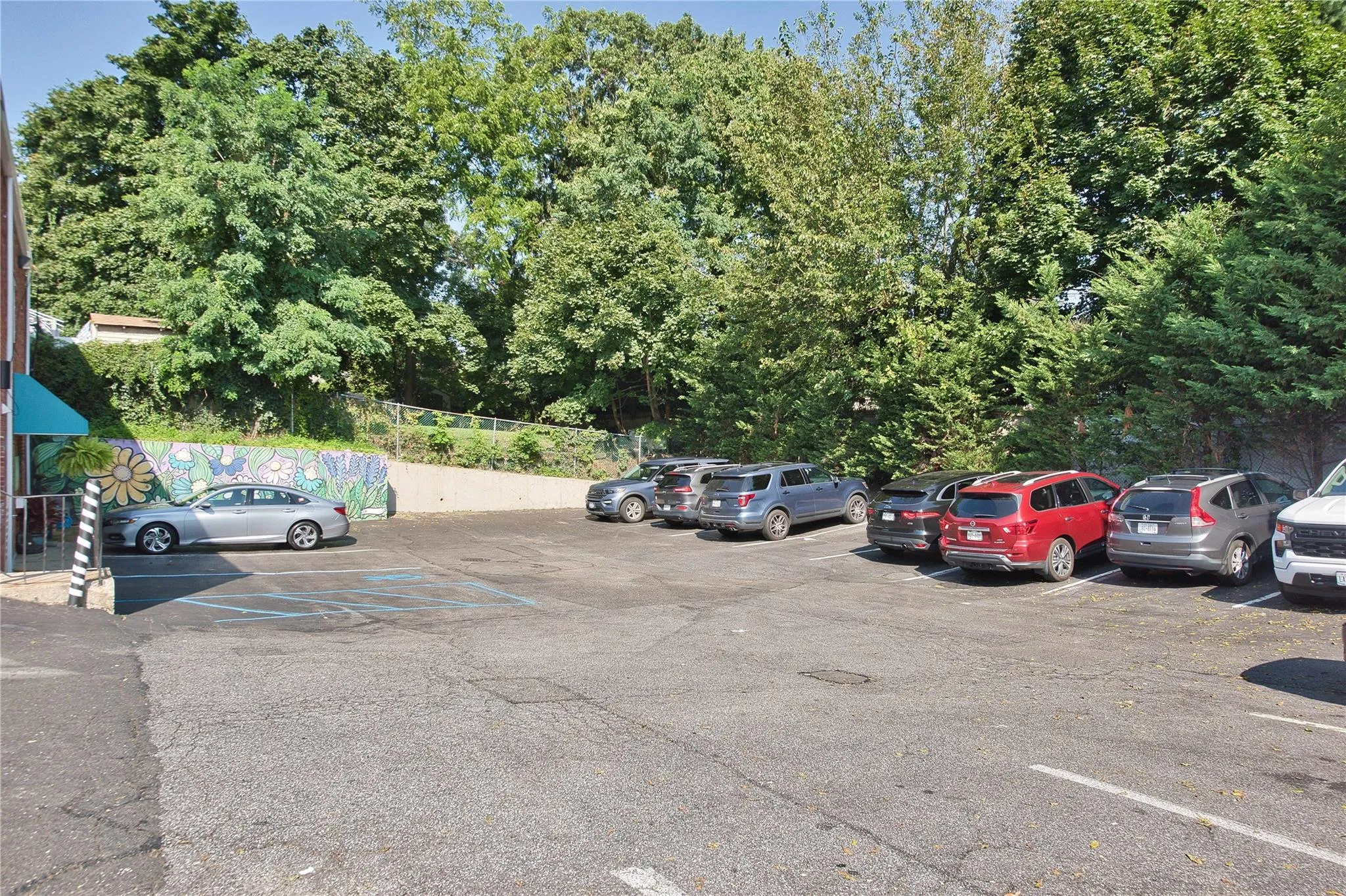 View of uncovered parking lot View of uncovered parking lot