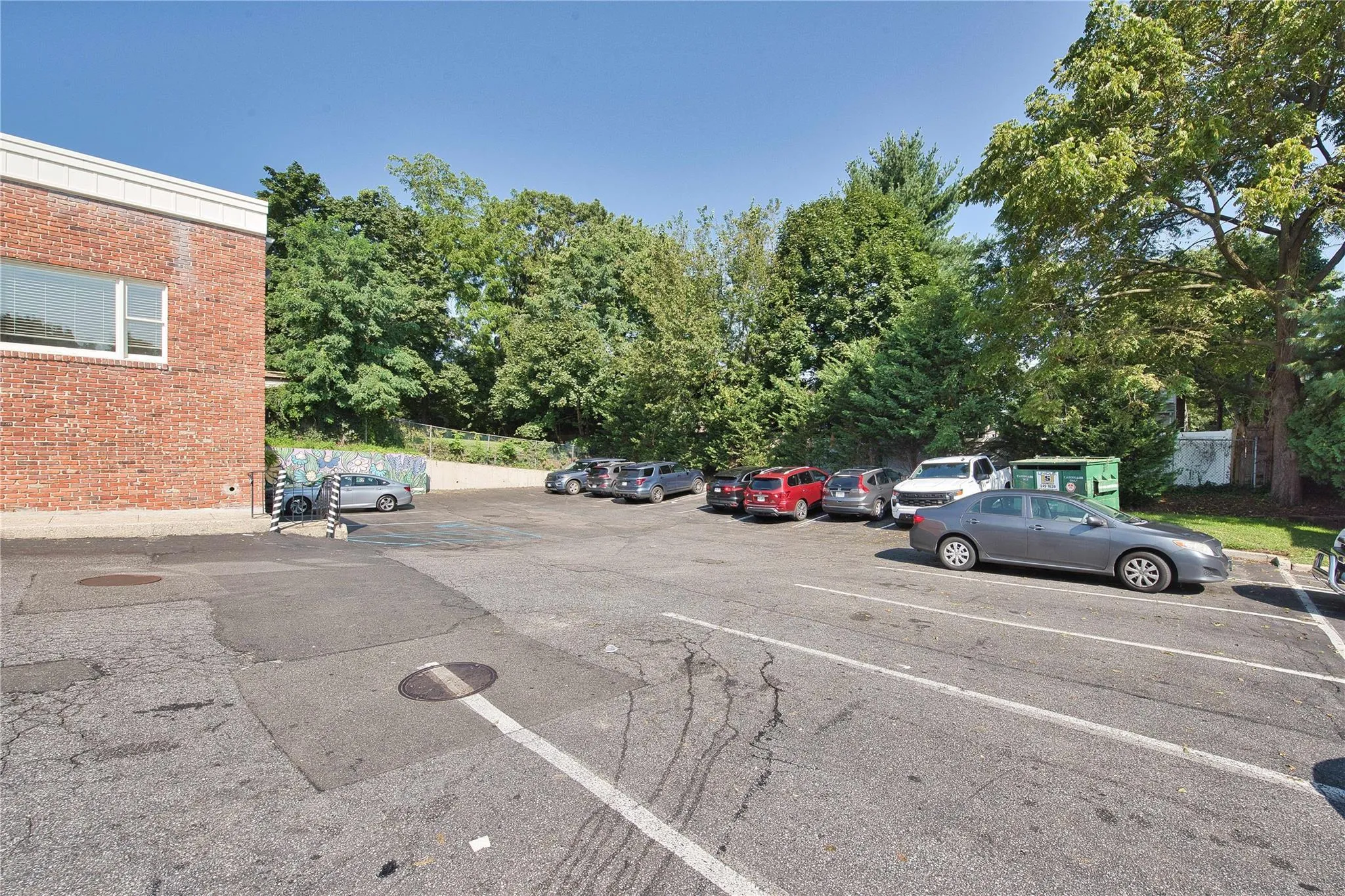 View of uncovered parking lot View of uncovered parking lot