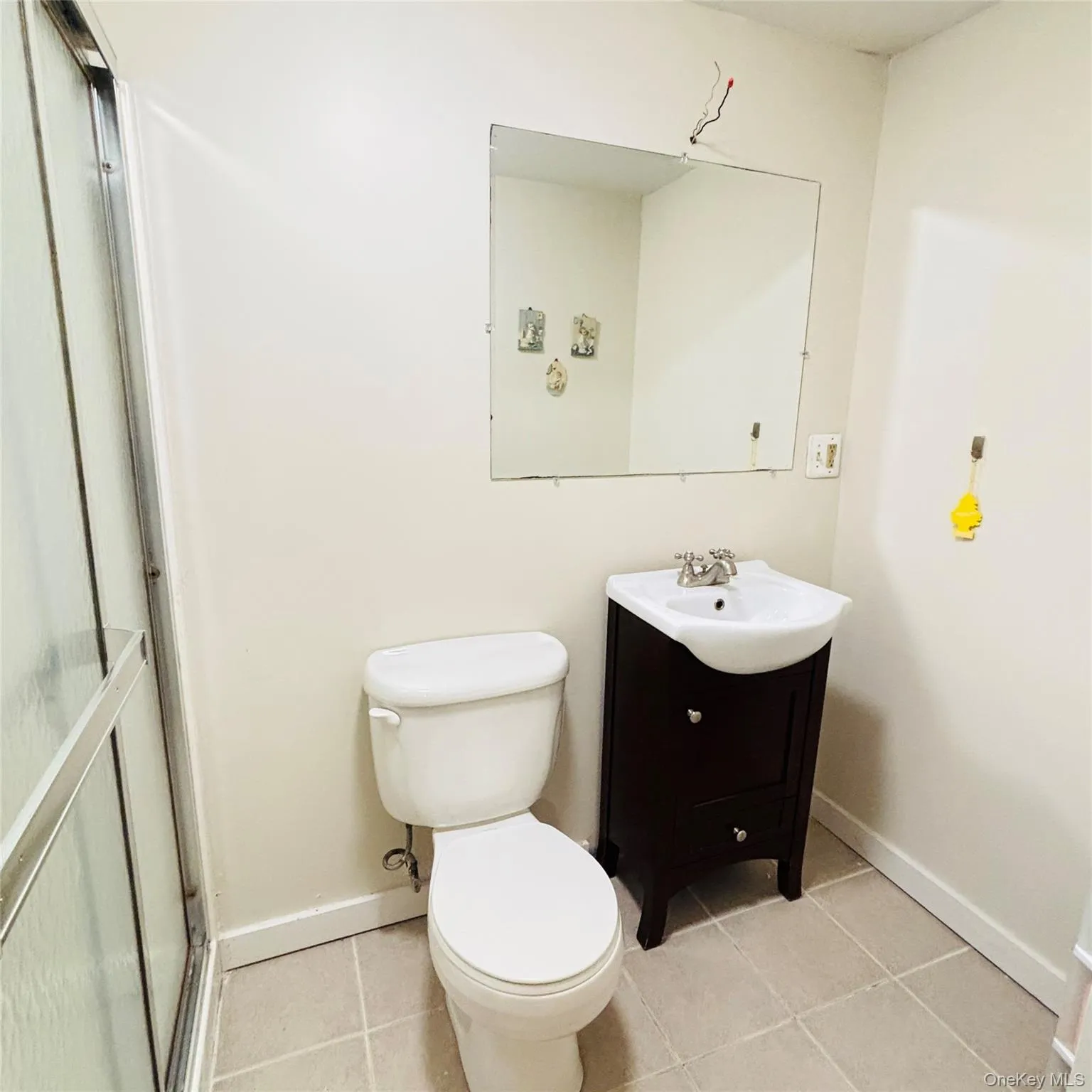 Basement bathroom features a shower. Basement bathroom features a shower.