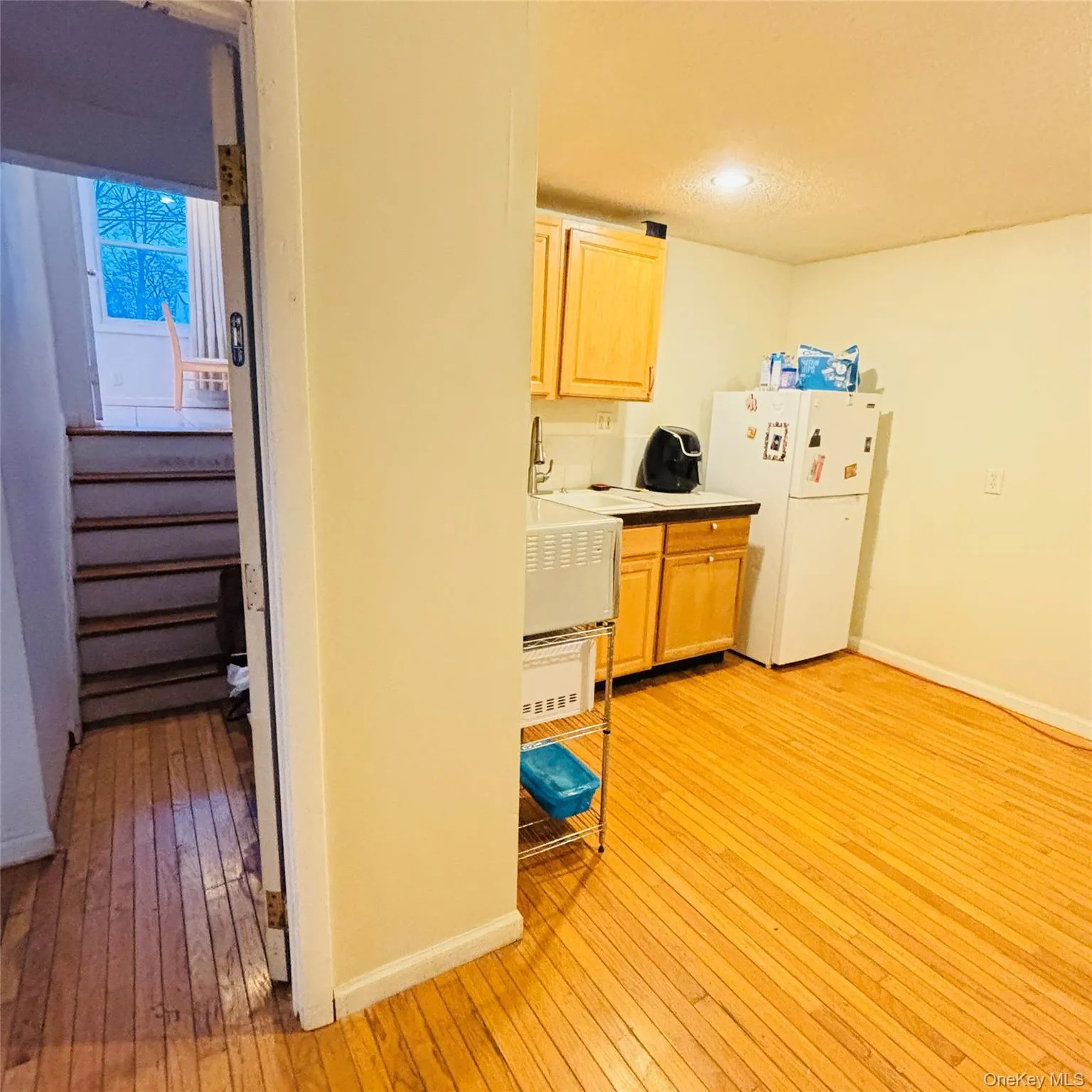 Interior access to the finished basement is from the hall shown on the left - And to the left of the hall is the laundry room shown in the next photo. Interior access to the finished basement is from the hall shown on the left - And to the left of the hall is the laundry room shown in the next photo.