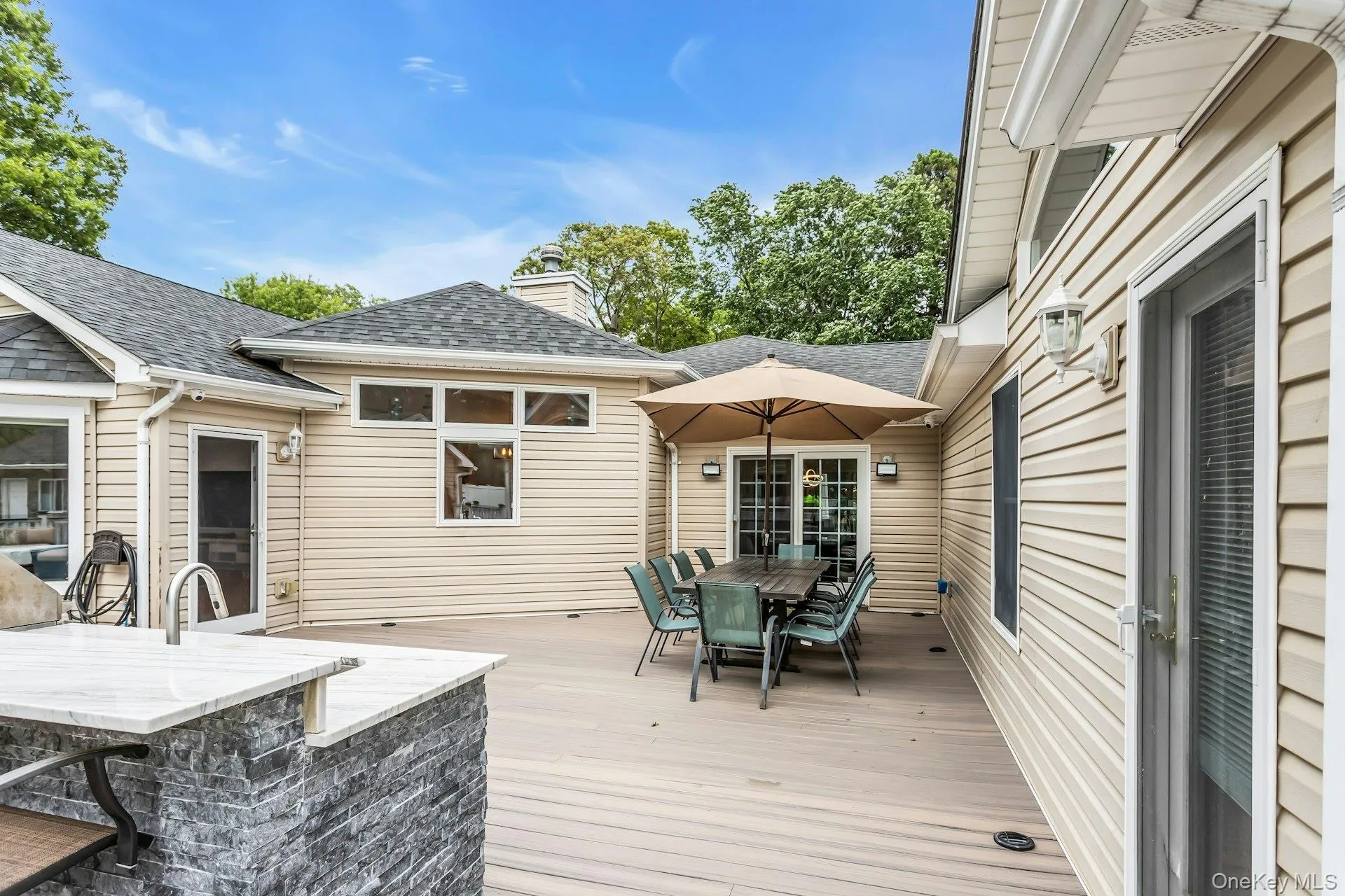 Deck featuring outdoor dining area Deck featuring outdoor dining area