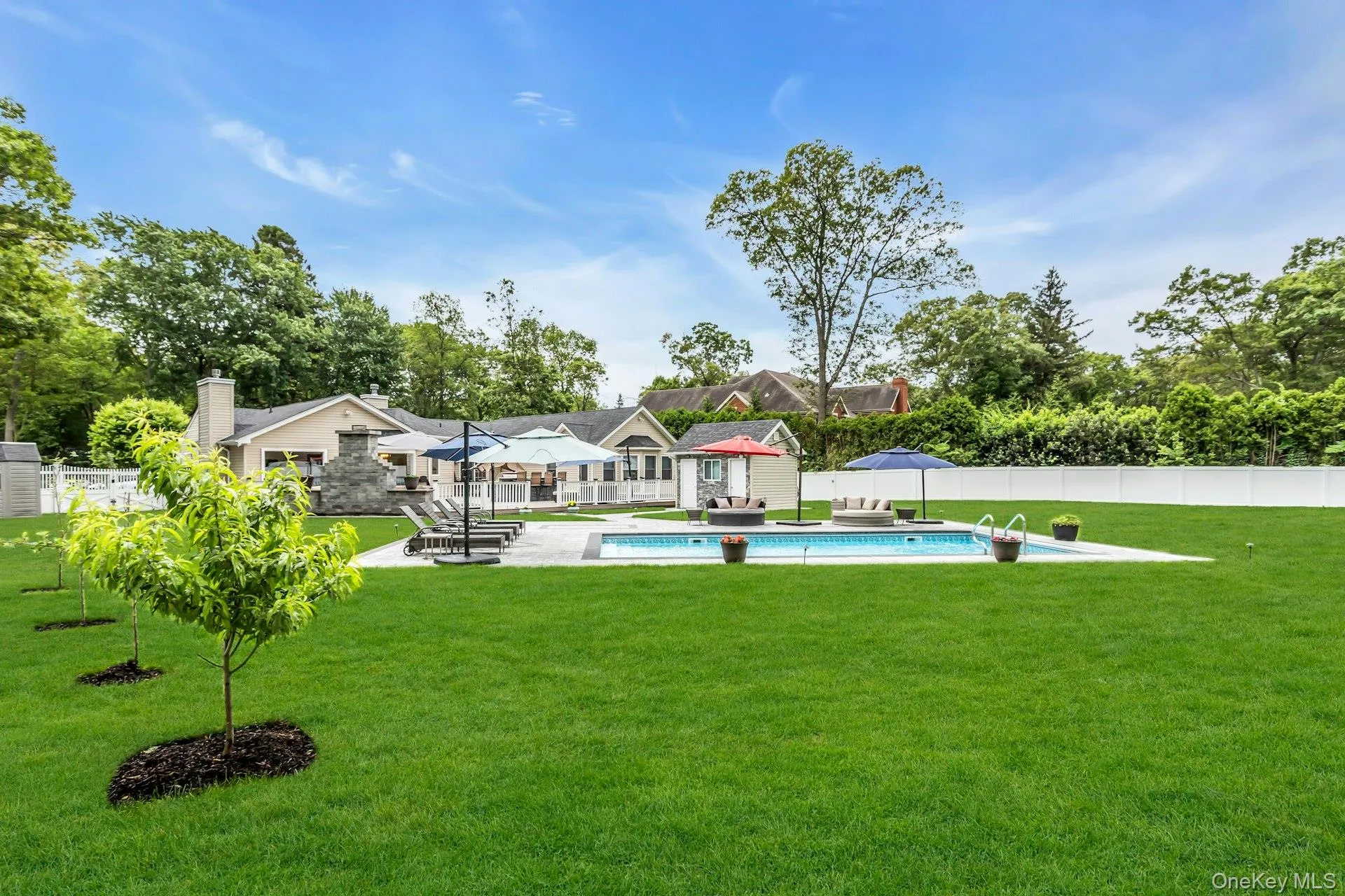 View of pool with a patio View of pool with a patio