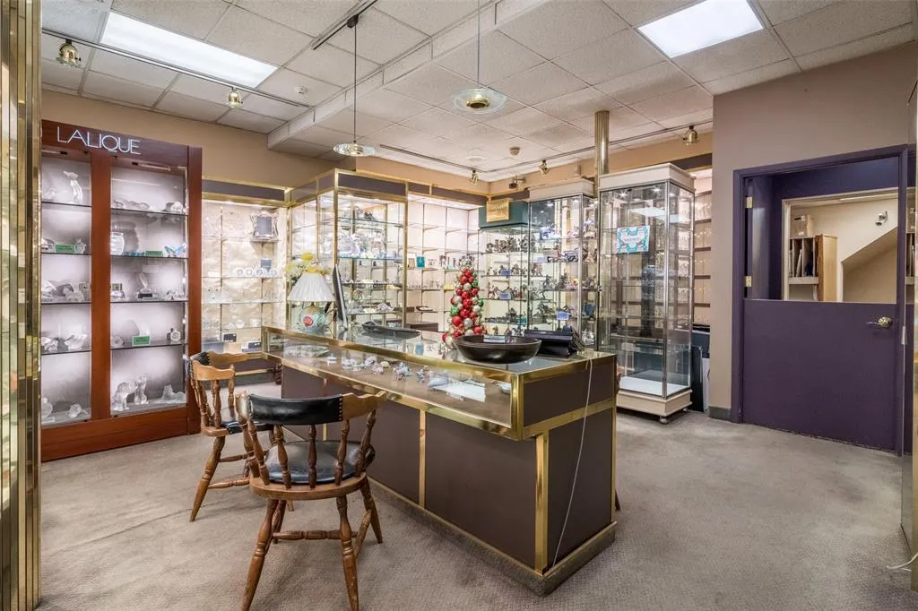 Bar with a drop ceiling and carpet floors Bar with a drop ceiling and carpet floors