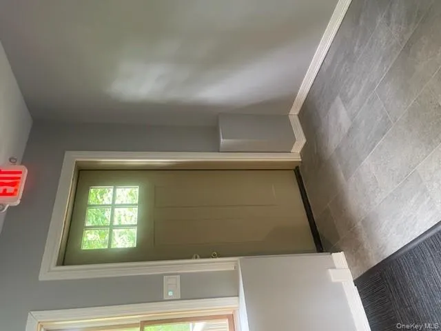 Entrance foyer featuring baseboards Entrance foyer featuring baseboards