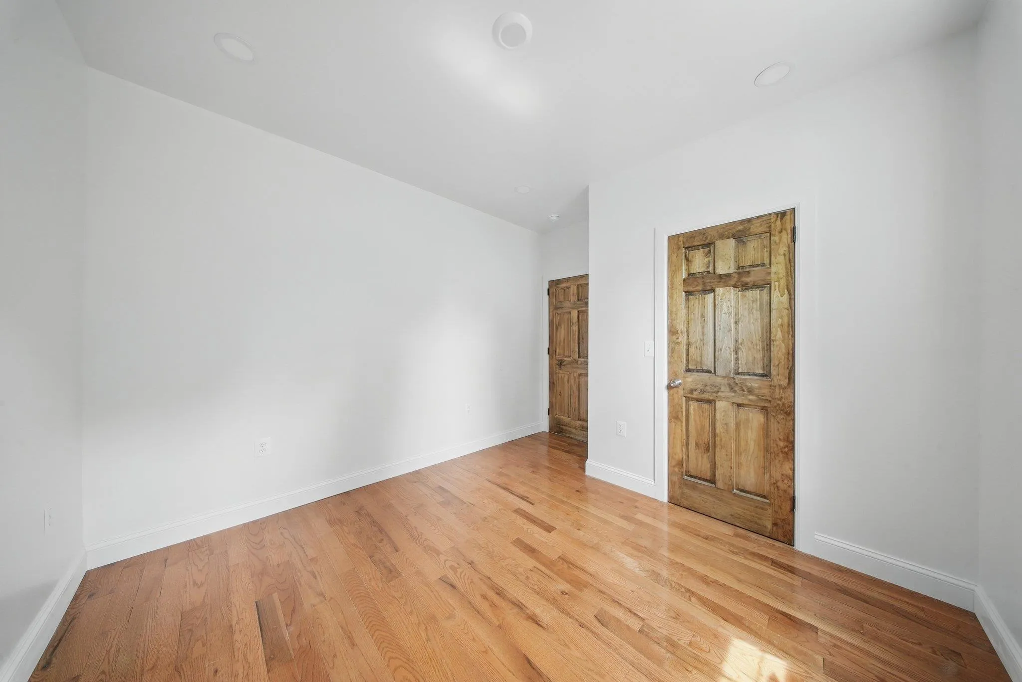 Bedroom with light wood floors Bedroom with light wood floors