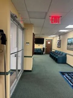 Common area featuring a paneled ceiling Common area featuring a paneled ceiling