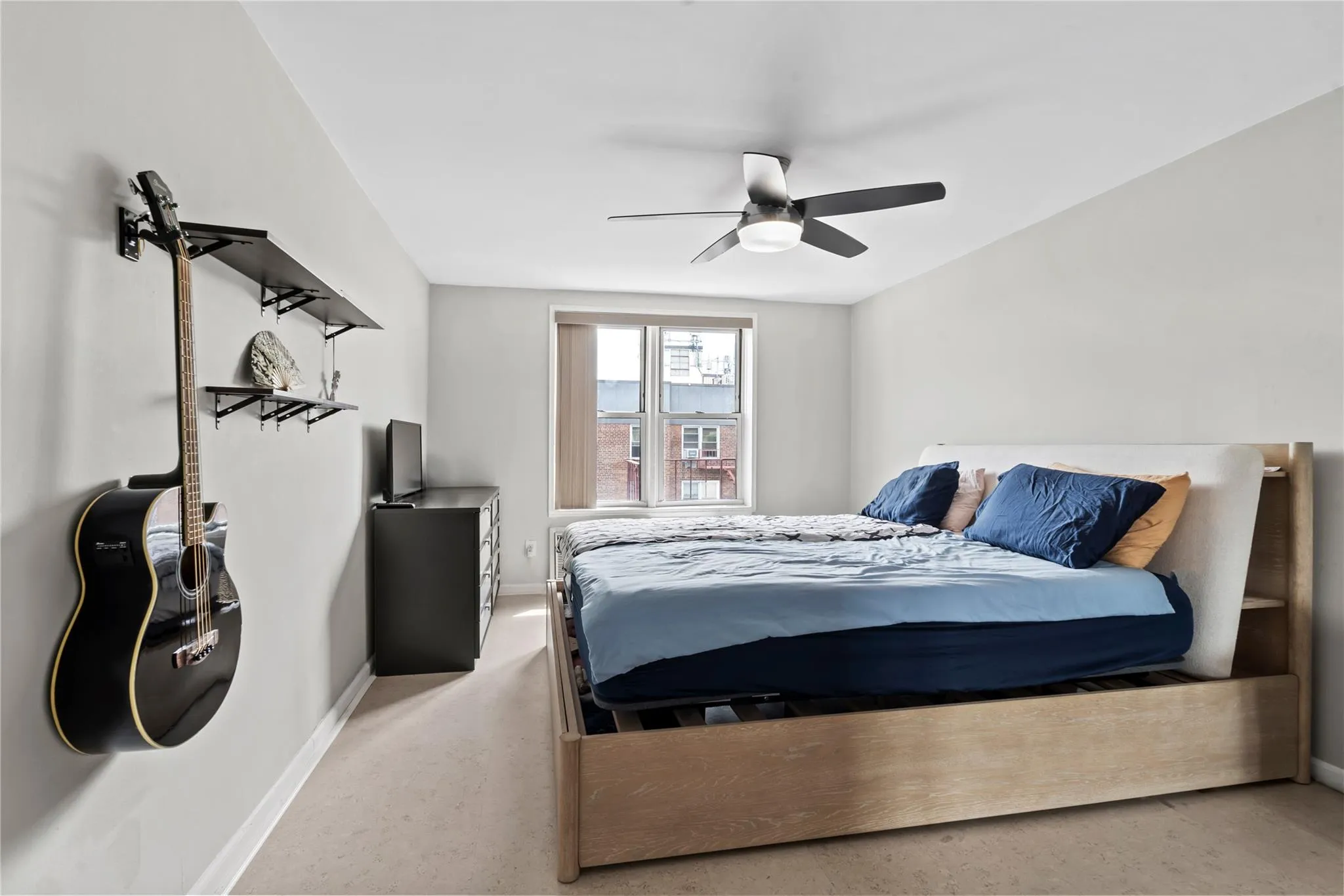 Bedroom featuring baseboards and a ceiling fan Bedroom featuring baseboards and a ceiling fan