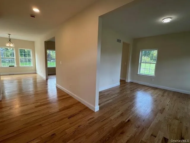 Spare room featuring light wood-style floors and recessed lighting Spare room featuring light wood-style floors and recessed lighting