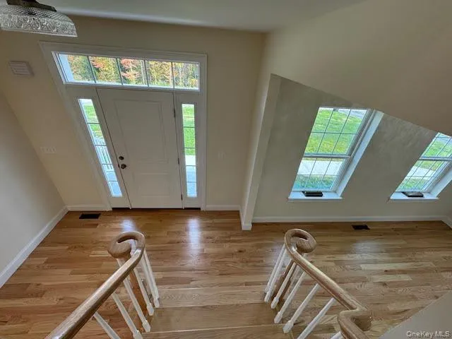 Entryway featuring light wood-type flooring Entryway featuring light wood-type flooring