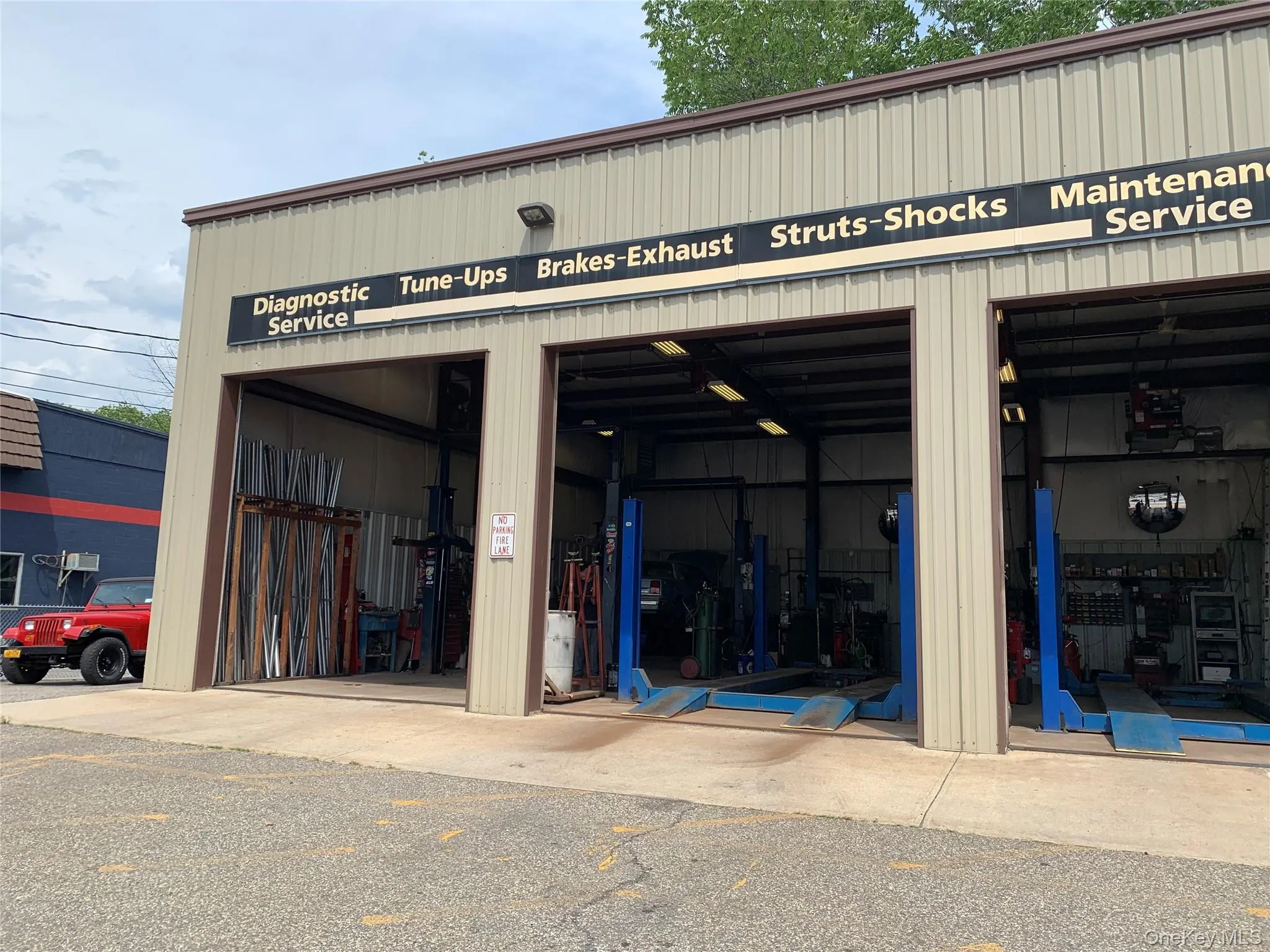 View of property with a garage View of property with a garage