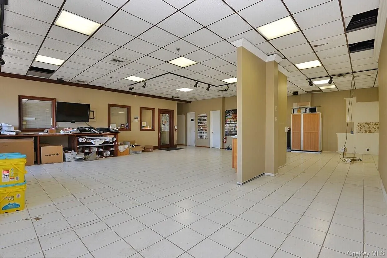 Home office featuring a drop ceiling Home office featuring a drop ceiling